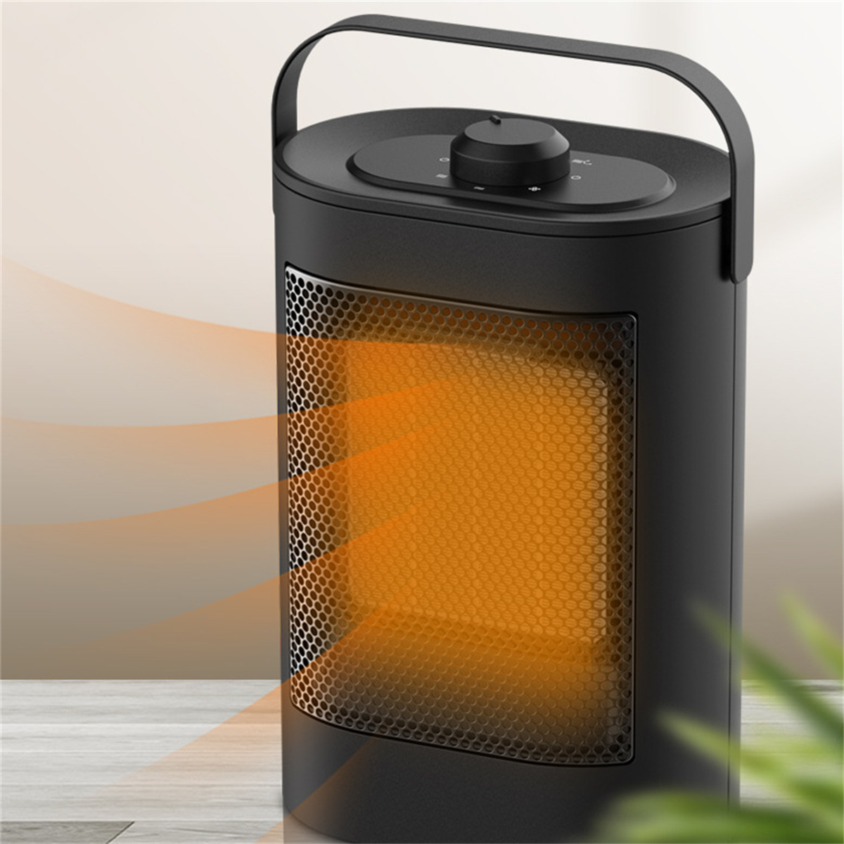 Schwarze Elektroheizung mit Griff, innen orangefarben leuchtend, auf weißem Hintergrund.