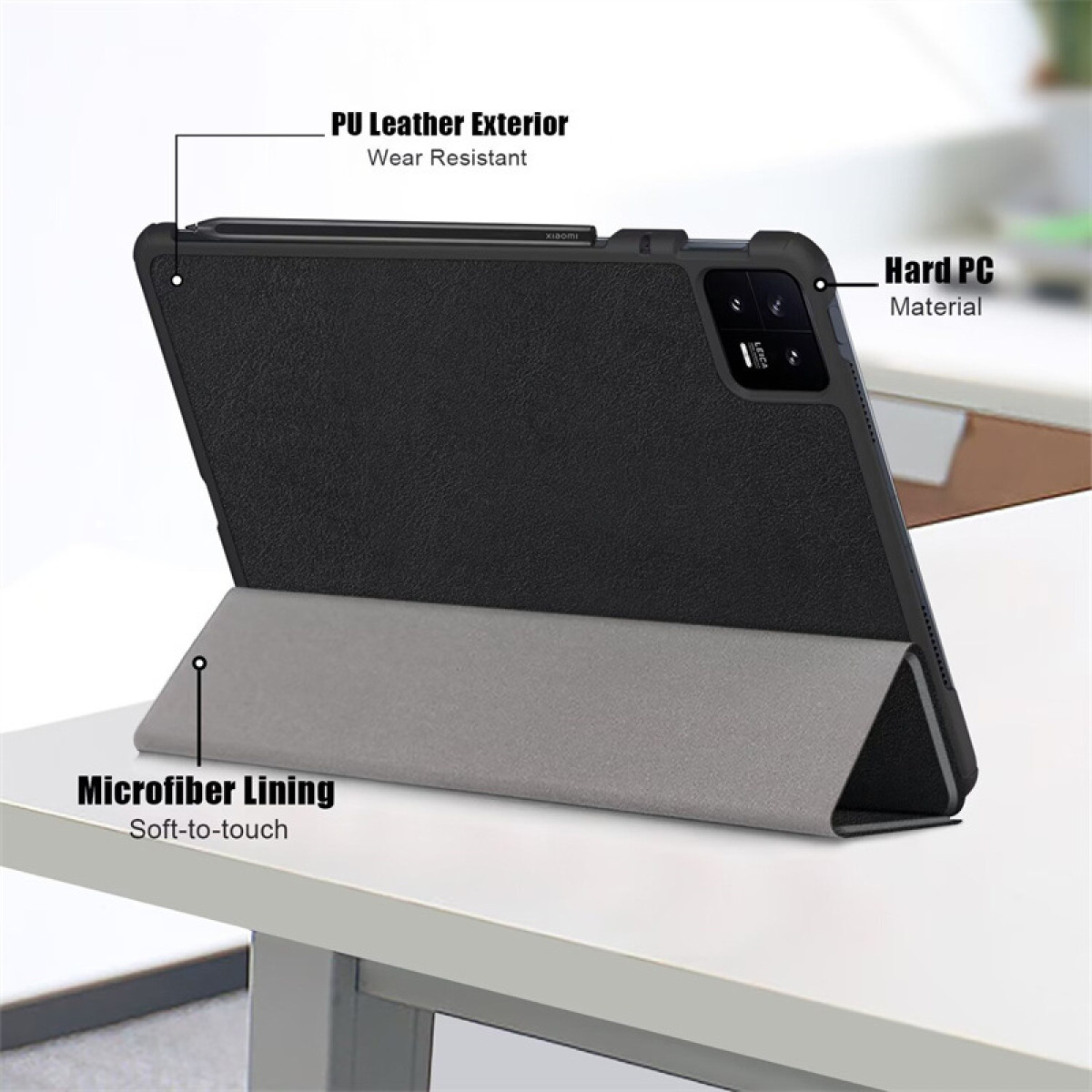 Custodia per tablet nera aperta per mostrare il tablet. La custodia è nera, con fodera grigia.