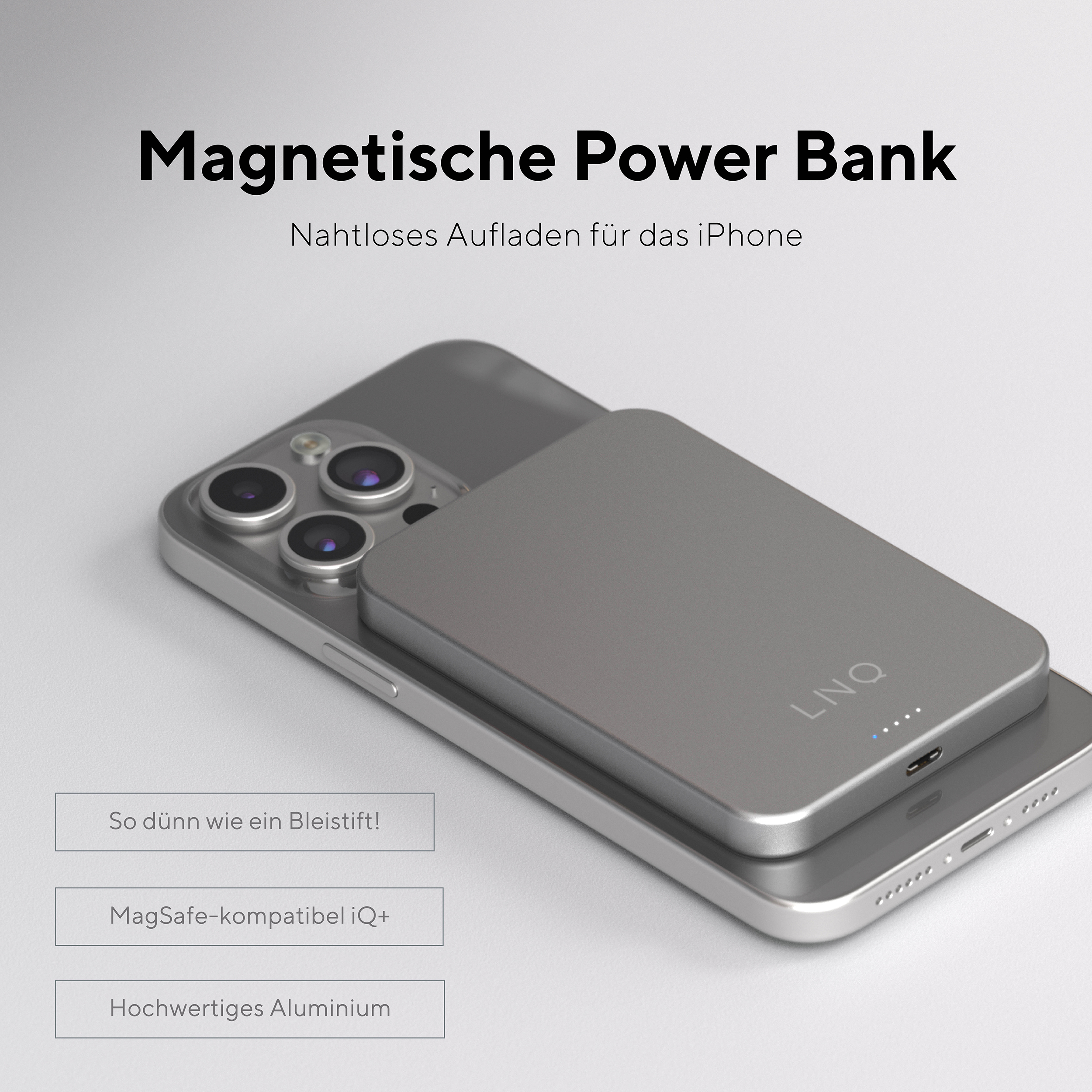 Eine silberne Powerbank mit einem Telefon oben drauf. Text und Symbole beschreiben Funktionen auf weißem Hintergrund.