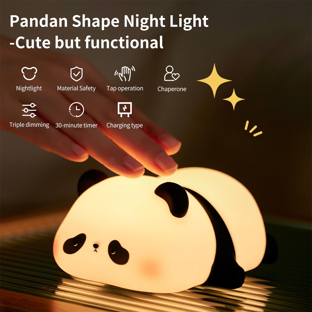 Ein panda-förmiges Nachtlicht. Das Licht ist weiß mit schwarzen Akzenten. Eine Hand berührt den Panda.