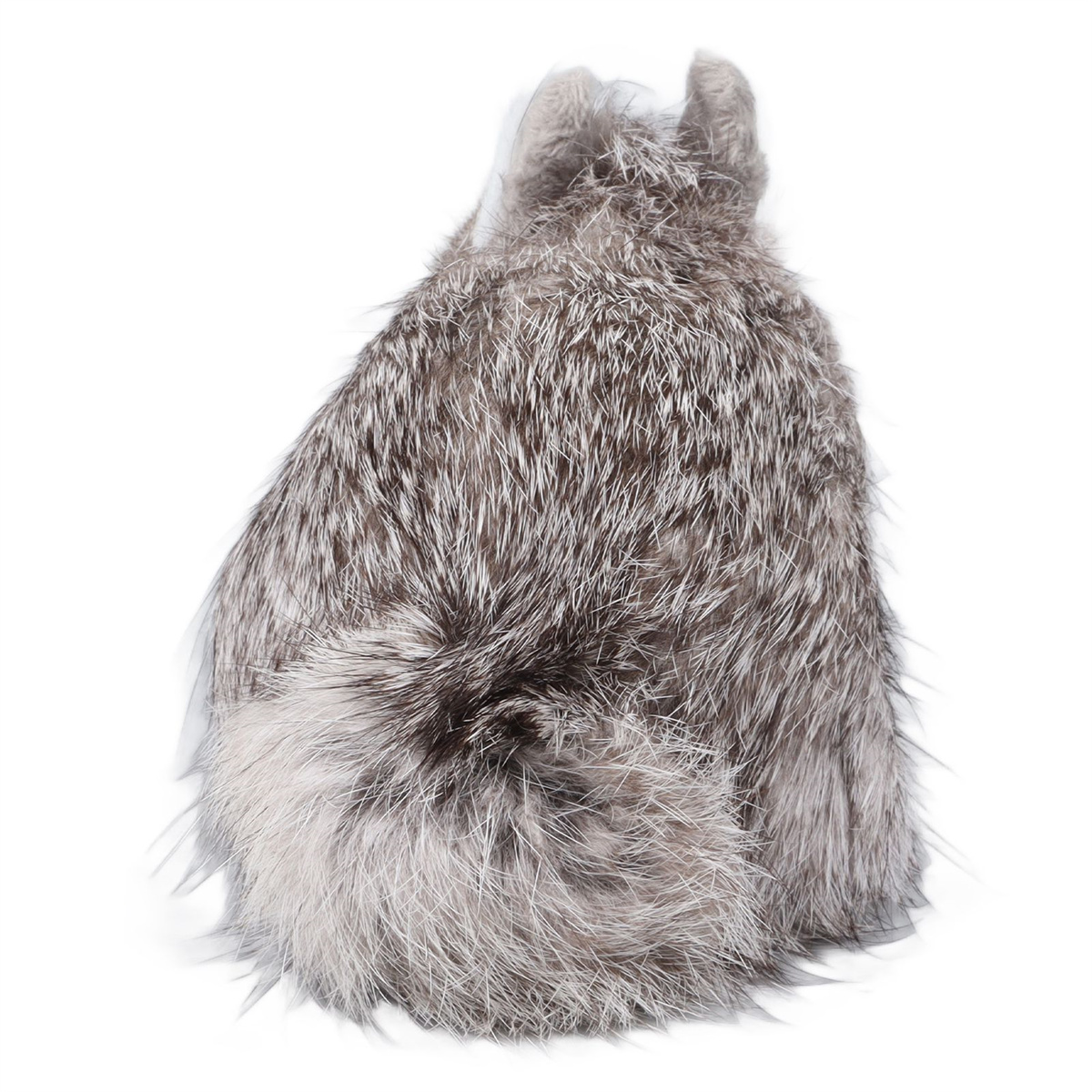 Ein flauschiger Tier-Schwanz, wahrscheinlich ein Fuchs, auf weißem Grund.