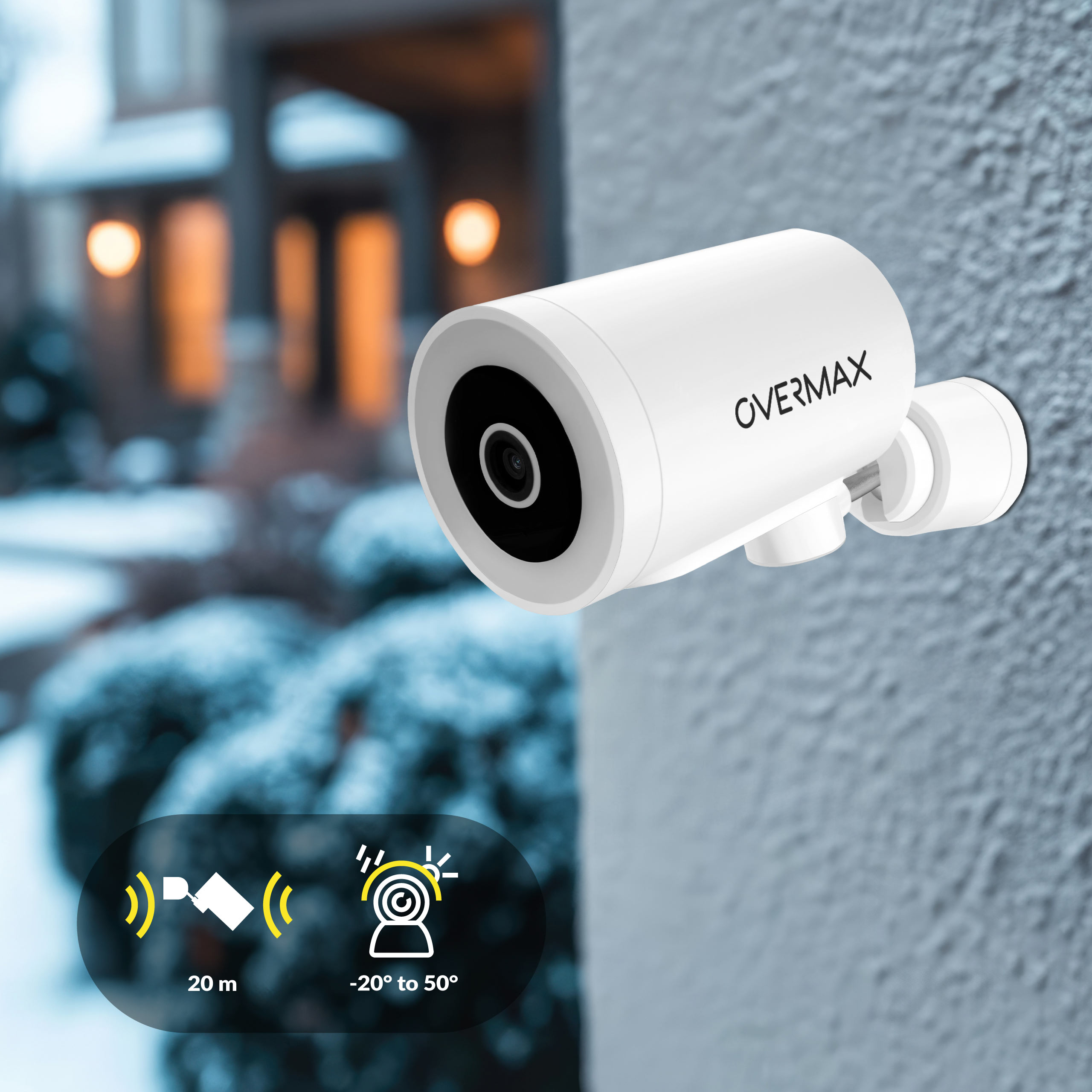 Biała kamera bezpieczeństwa zamontowana na ścianie, z ikonami zasięgu i temperatury.