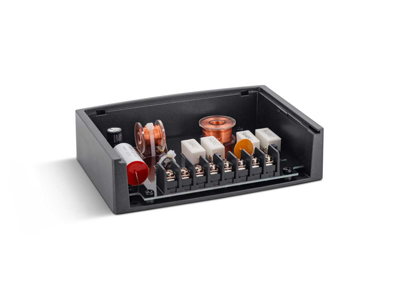 Offene schwarze Box mit elektronischen Bauteilen, einschließlich Spulen und Kondensatoren.