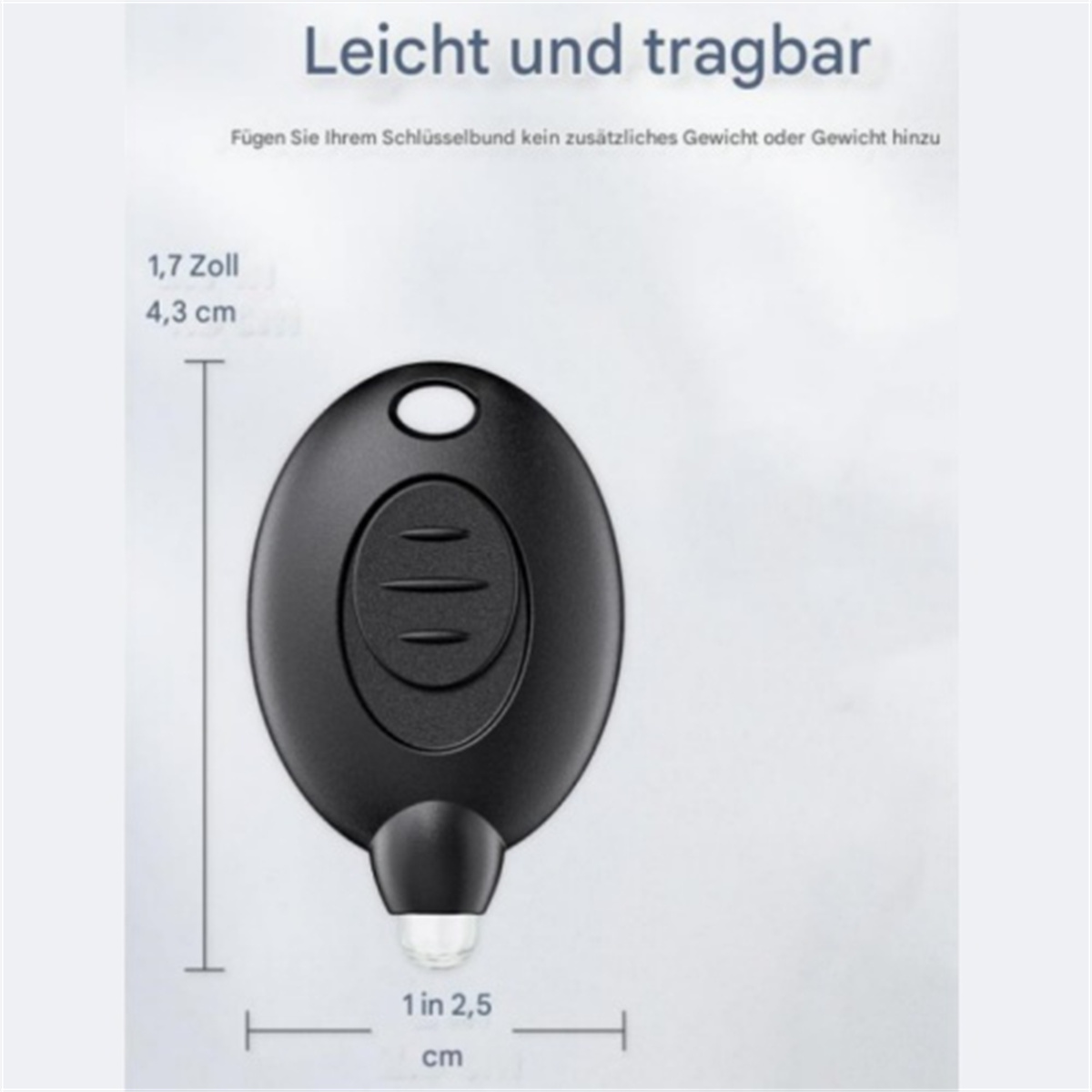 Schwarzer, ovaler Schlüsselanhänger mit Schlaufe. Er hat die Maße 1,7 Zoll und 1 Zoll.