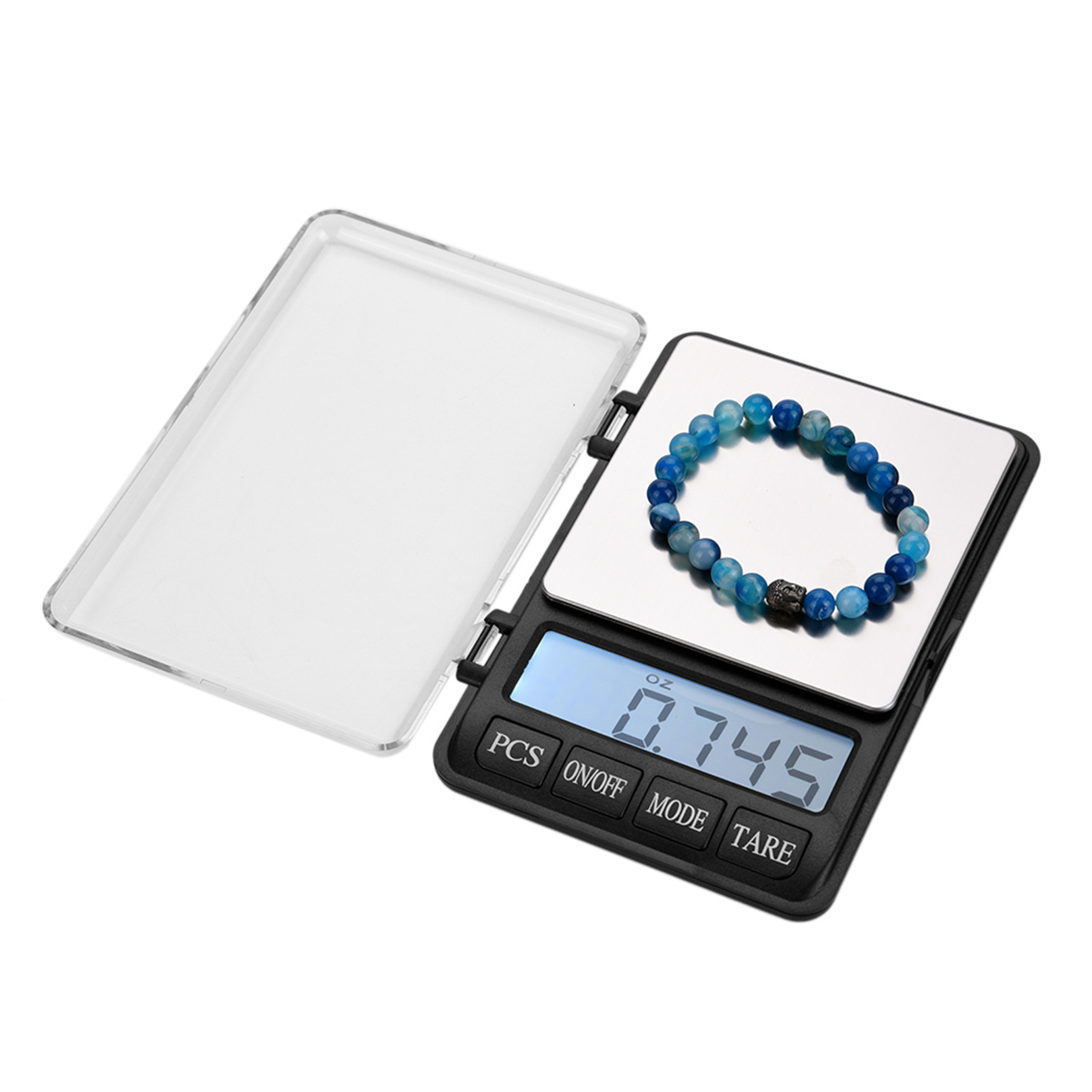 Eine kleine Digitalwaage mit einem blauen Perlenarmband in einem transparenten Etui.