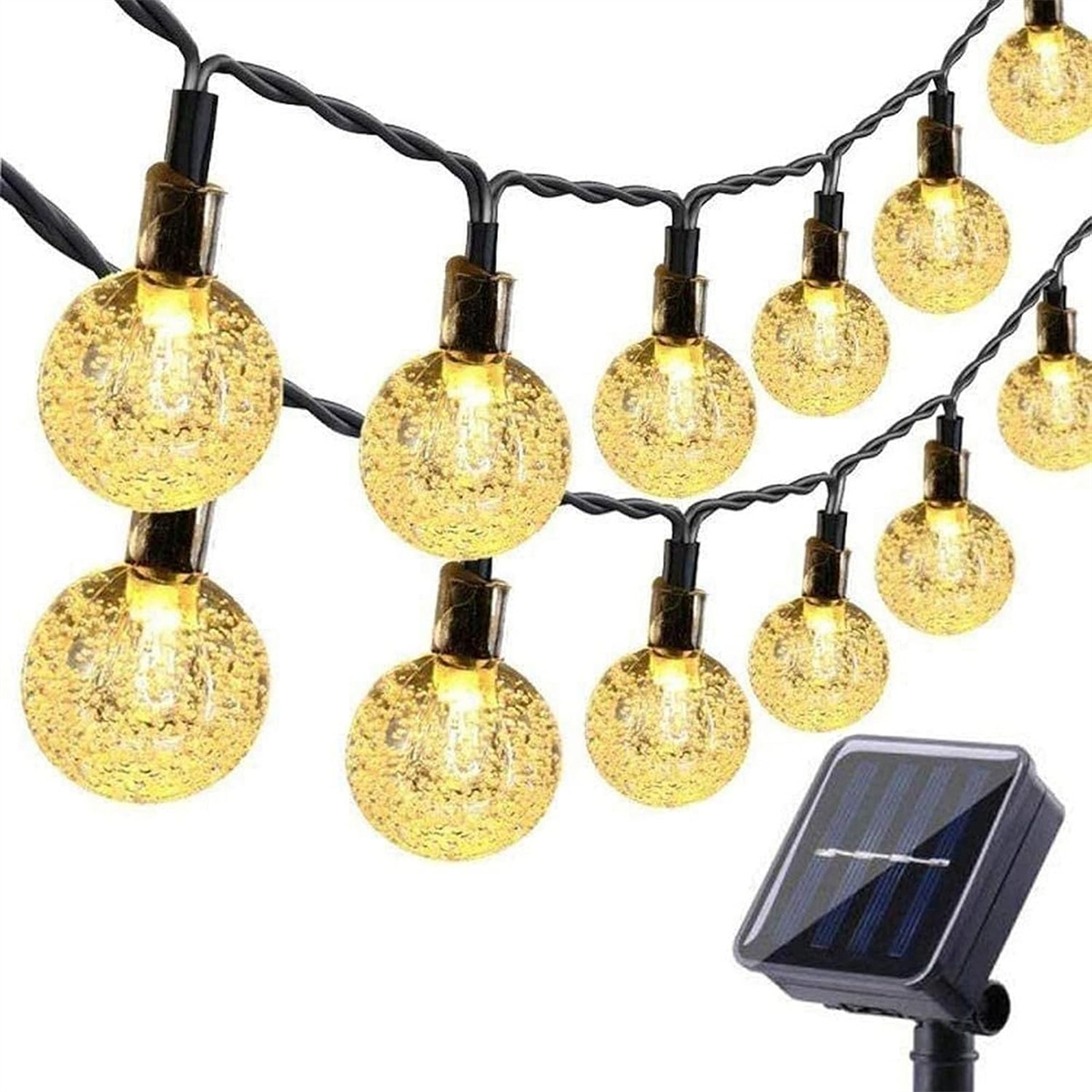 Lichterkette mit solarbetriebenen Kugellampen. Solarpanel im Vordergrund.