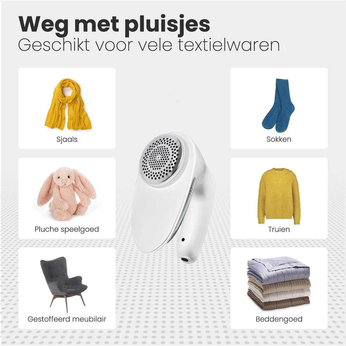 Witte stoffenscheerapparaat met diverse kledingstukken.
