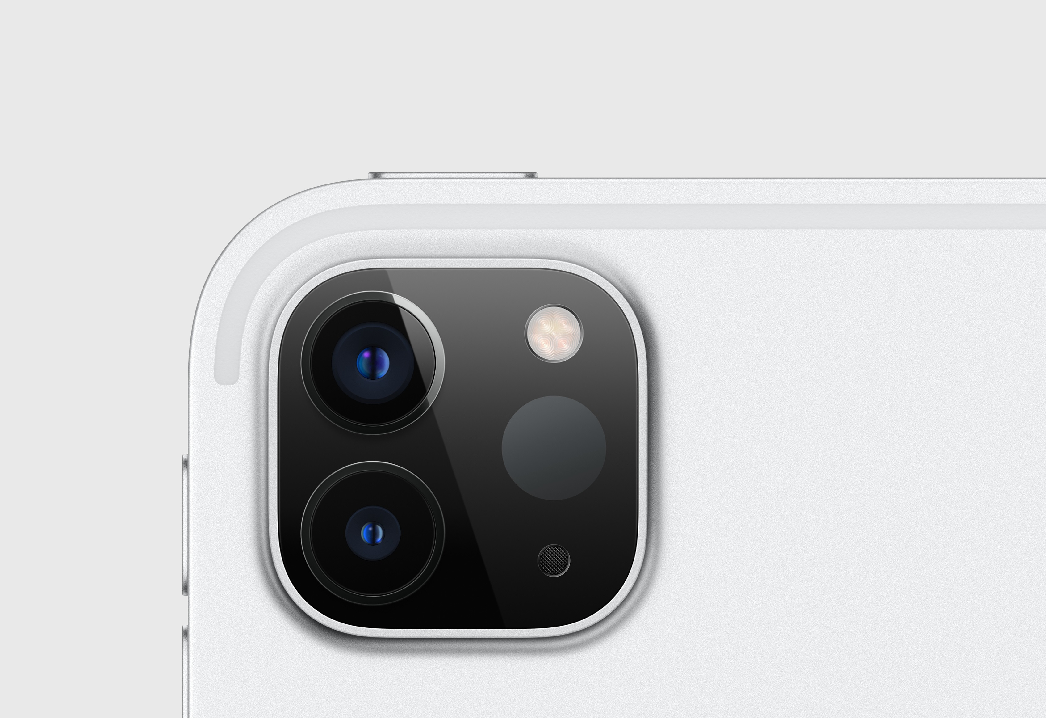 Close-up van de cameramodule van een witte tablet met twee lenzen en een flitser.