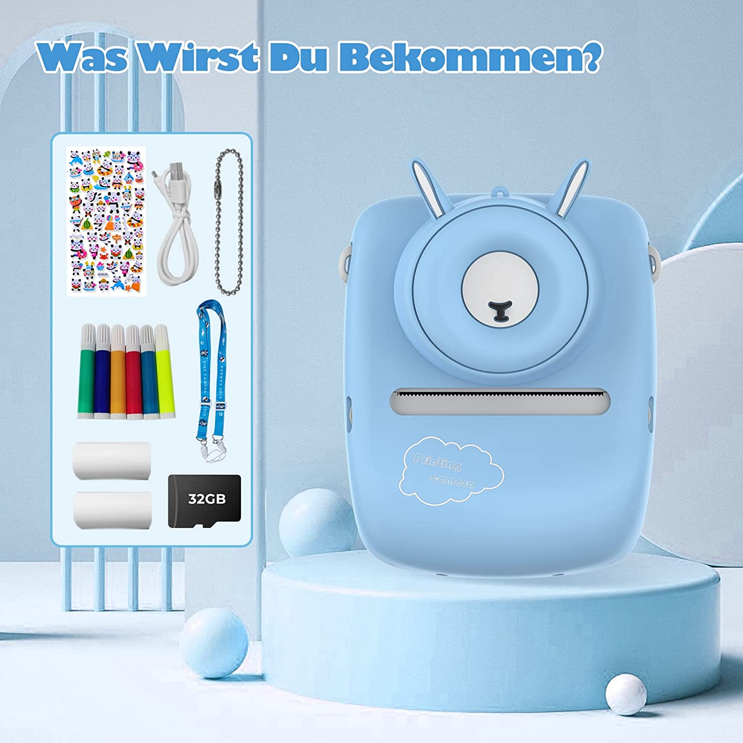 Eine blaue Sofortbildkamera mit Zubehör: Aufkleber, Stifte und eine 32GB-Karte.