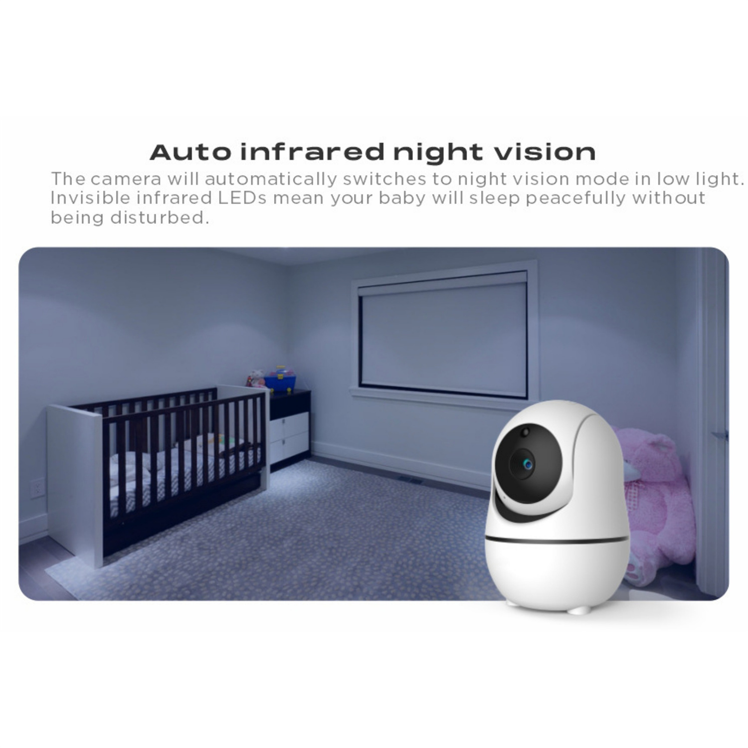 Weißer Babyphone auf einer Kommode in einem Kinderzimmer mit einem Kinderbett und einem rosa Teddybären.