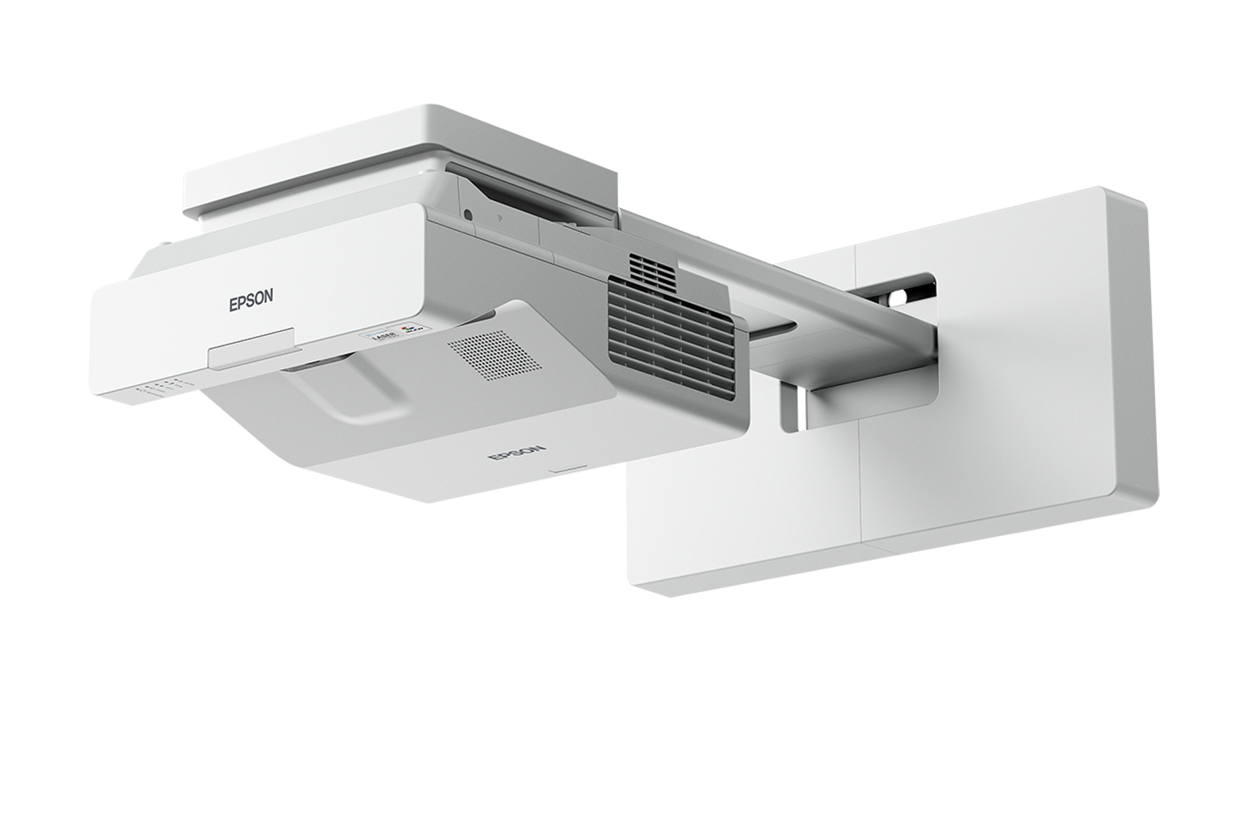 Un proiettore Epson bianco montato su una parete bianca. L'obiettivo è visibile.