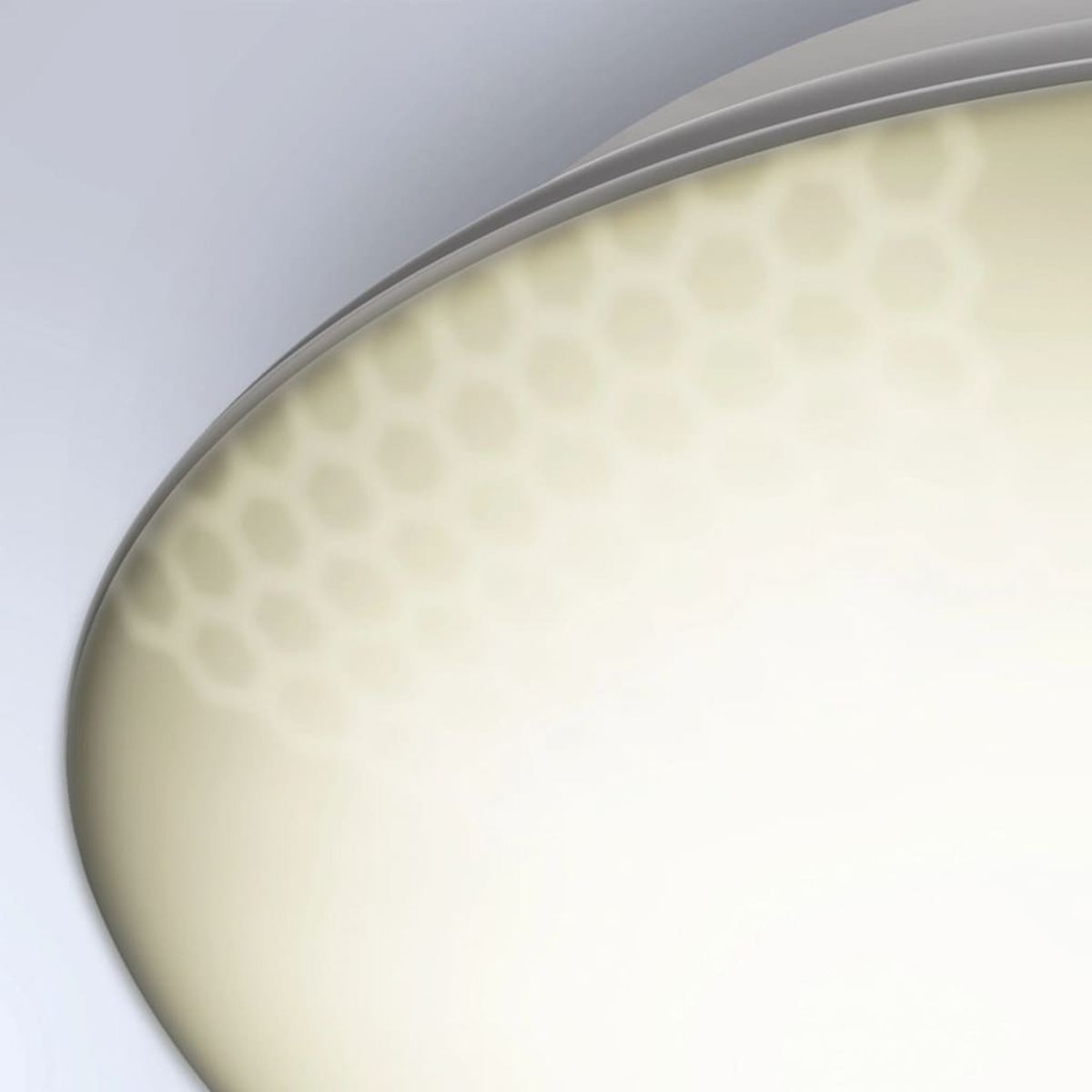 Abstraktes Bild einer gekrümmten Oberfläche mit Wabenmuster, das Licht emittiert, mit einem Gradientenhintergrund.