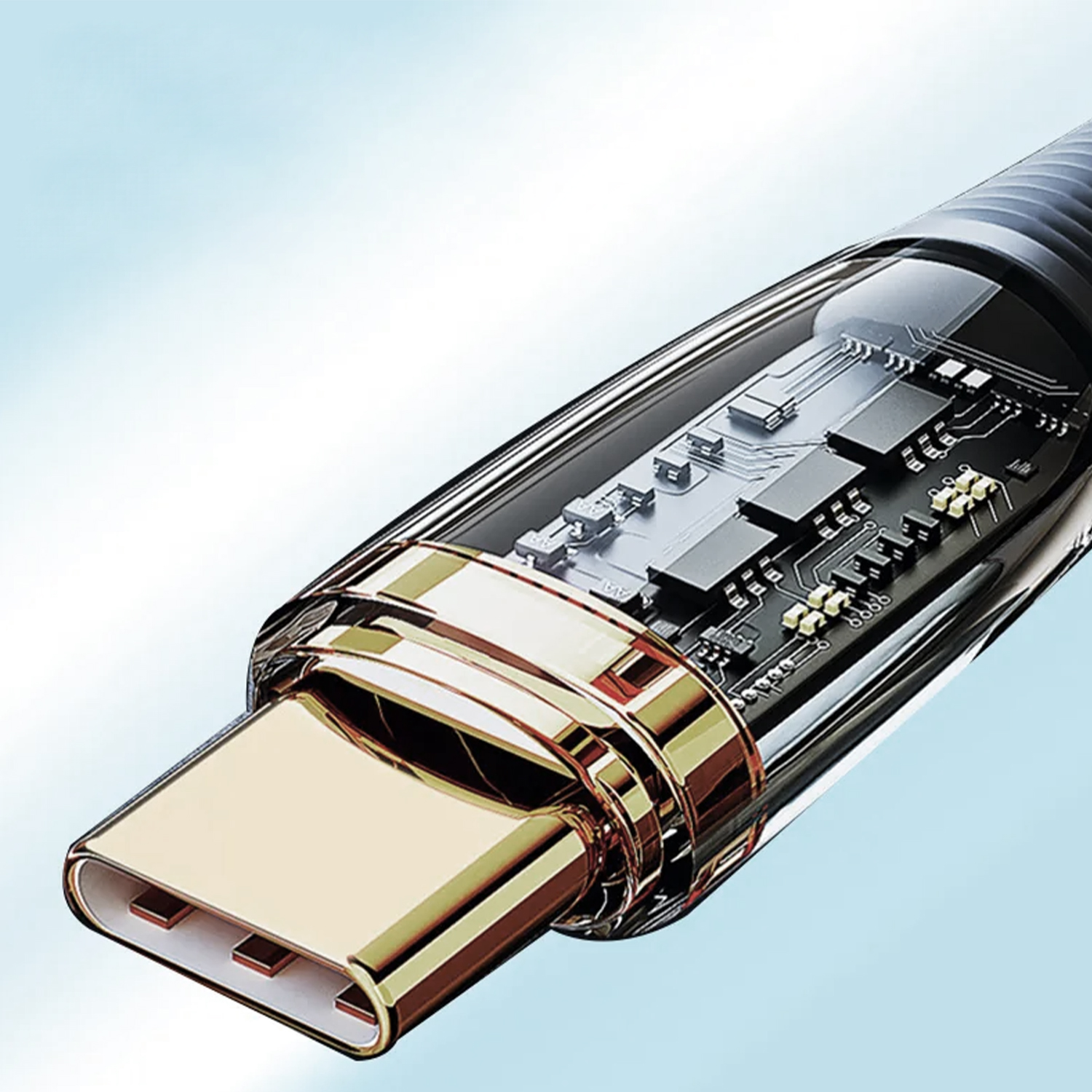 USB-C-Kabel mit transparentem Gehäuse, das die interne Schaltung zeigt. Goldfarbener Metallanschluss.