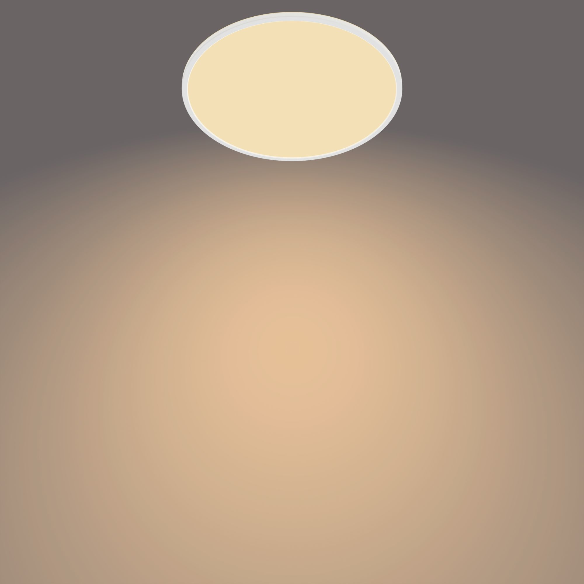 Plafoniera rotonda illuminata, bagliore giallo. Sfondo sfumato marrone.