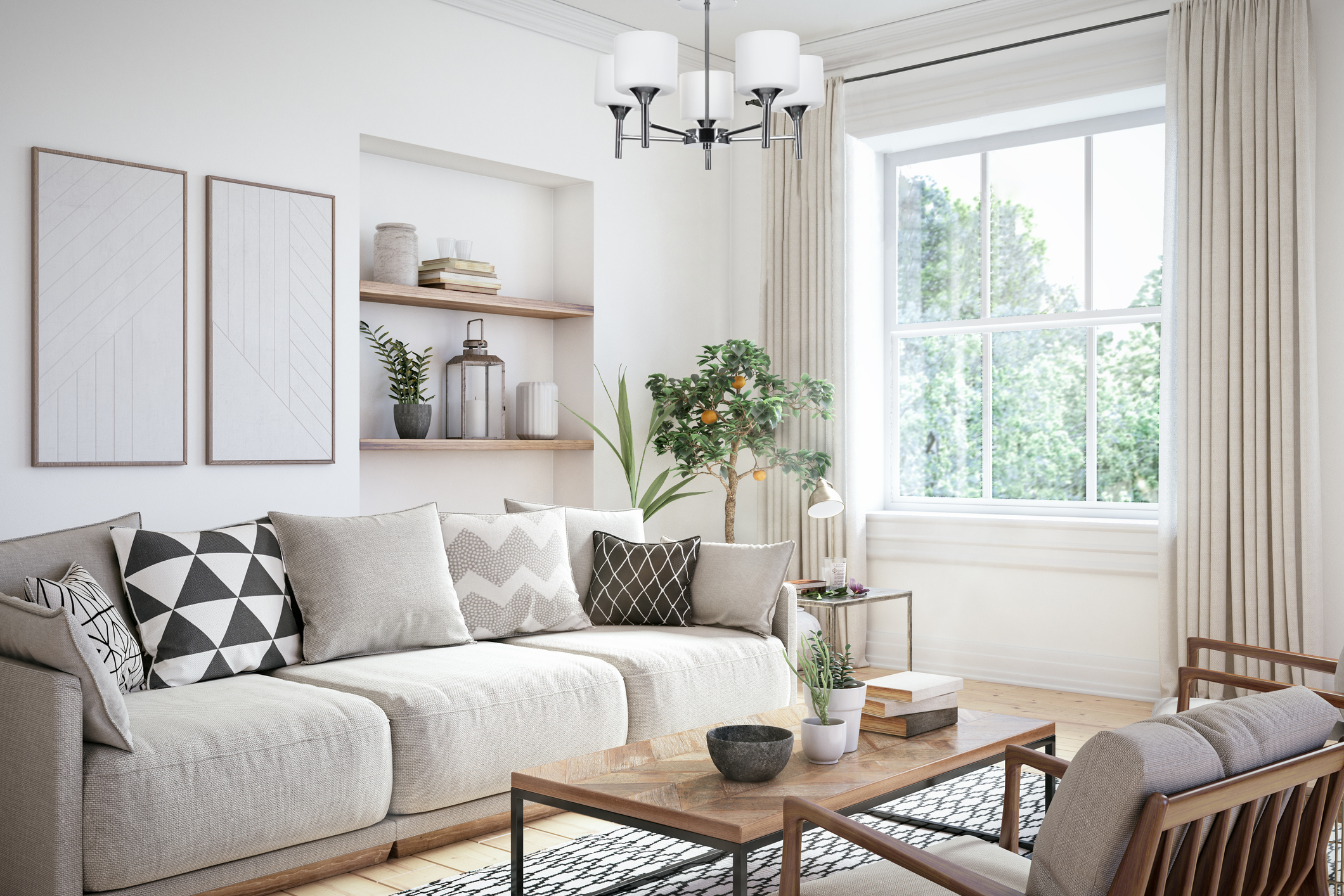 Salon z sofą, stolikiem kawowym, oknem i sztuką. Żyrandol wisi nad nimi.