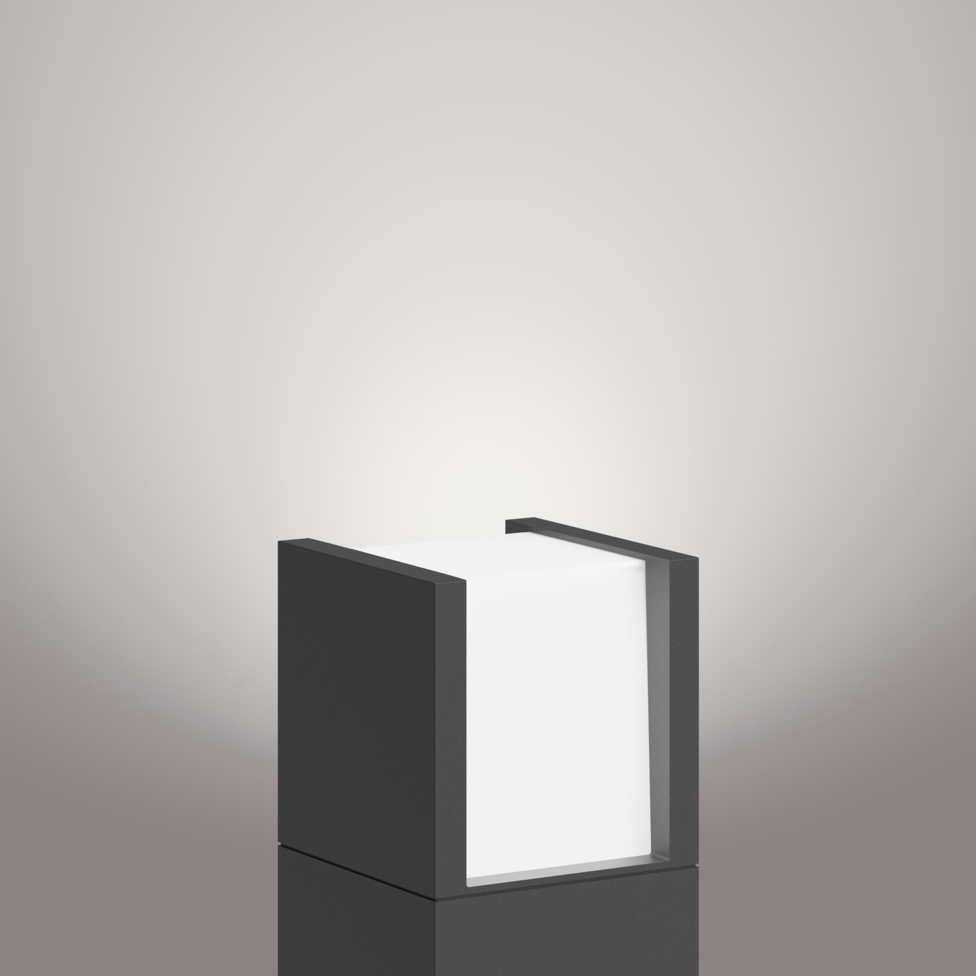 Schwarz-weiße Außenlampe mit Würfelform. Sie strahlt Licht aus dem weißen Inneren ab.