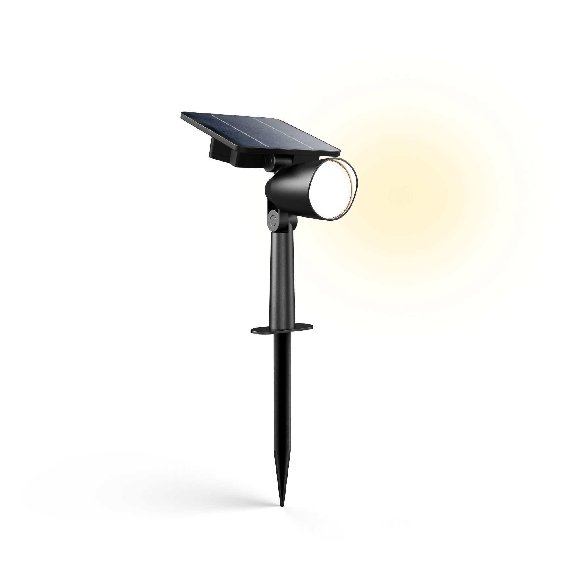 Un faretto solare nero con pannello solare, che emette luce gialla calda.