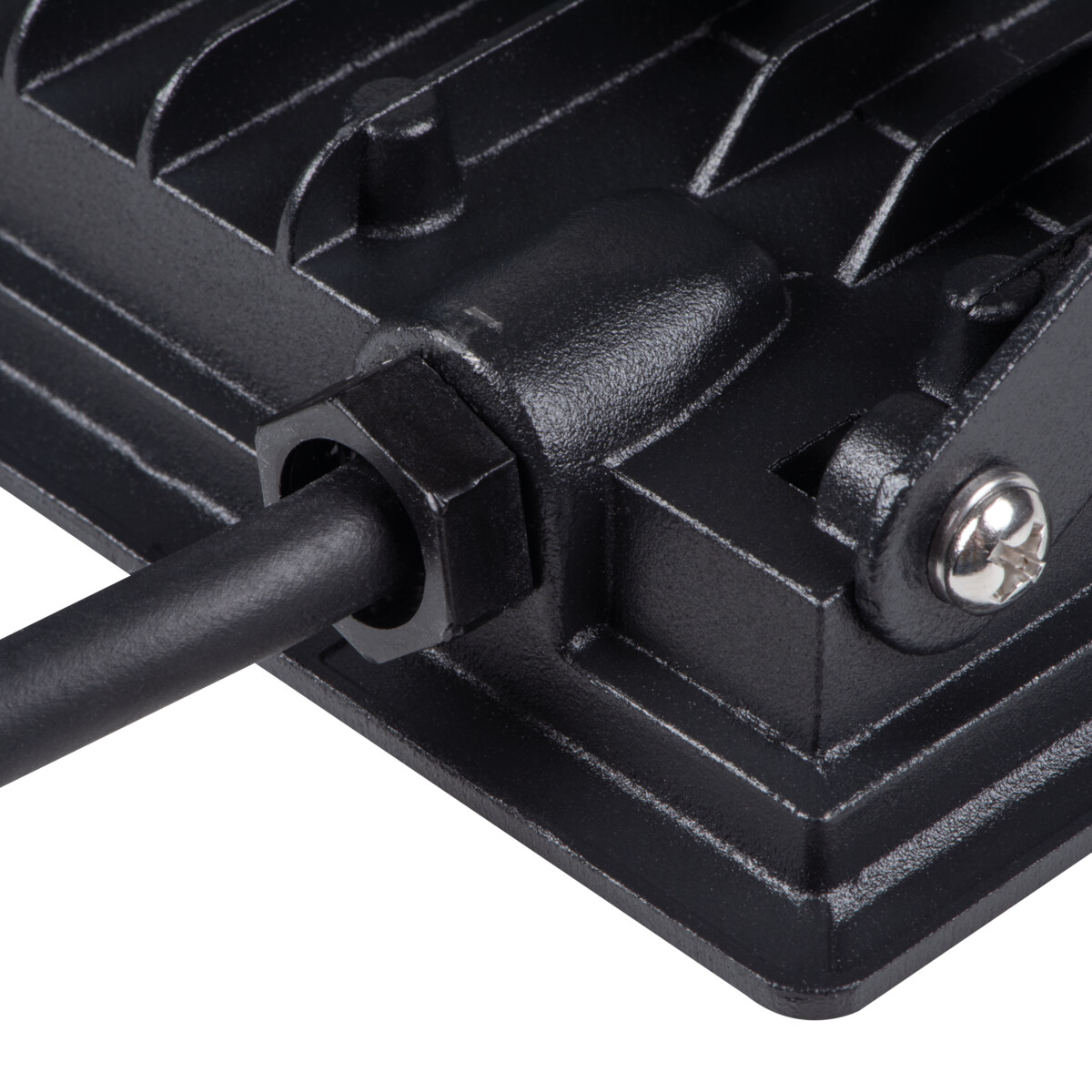 Close up of a black flood light with a cable and screw.