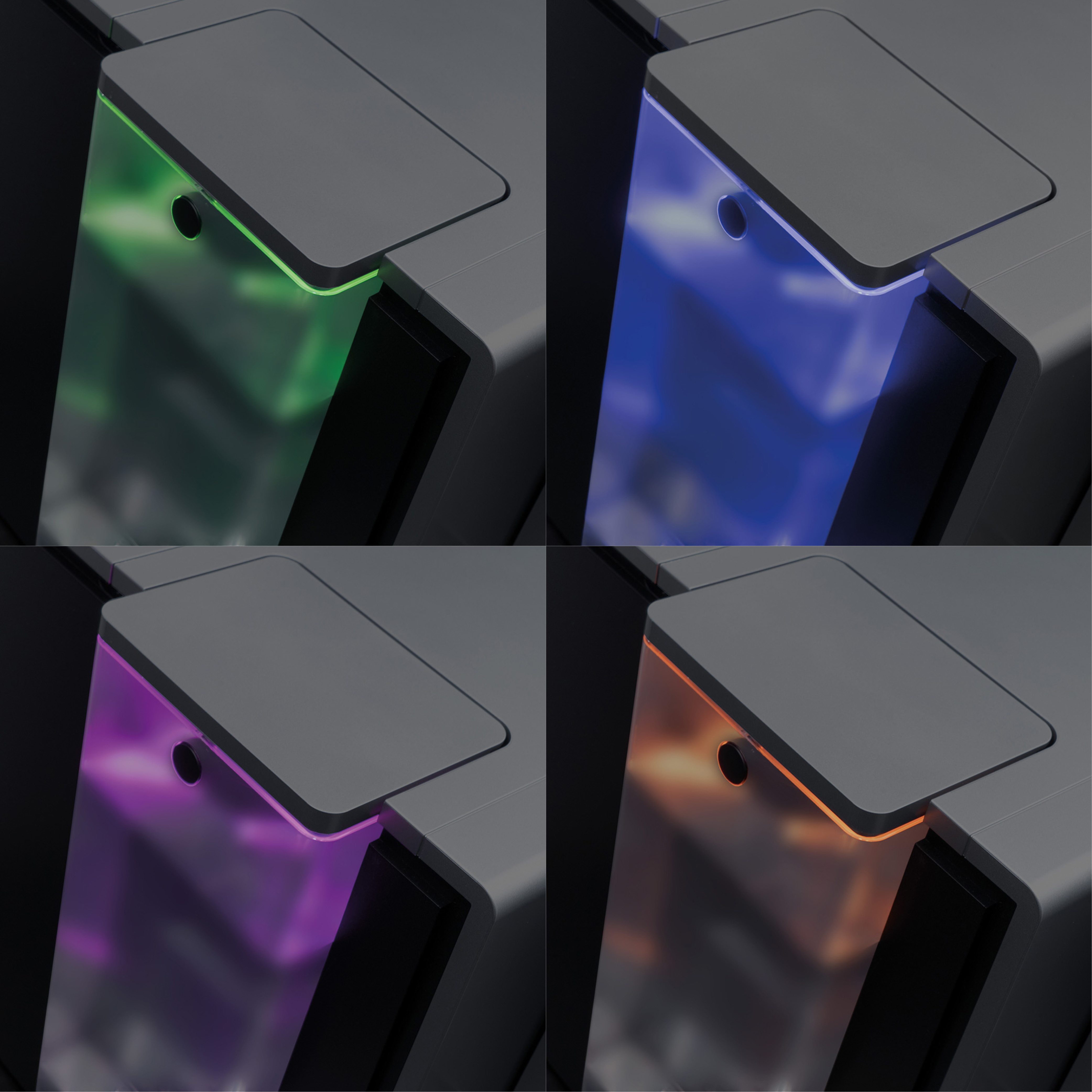 Primo piano di un dispositivo con parte superiore nera e pannello trasparente con luci verdi, blu, viola e arancioni.