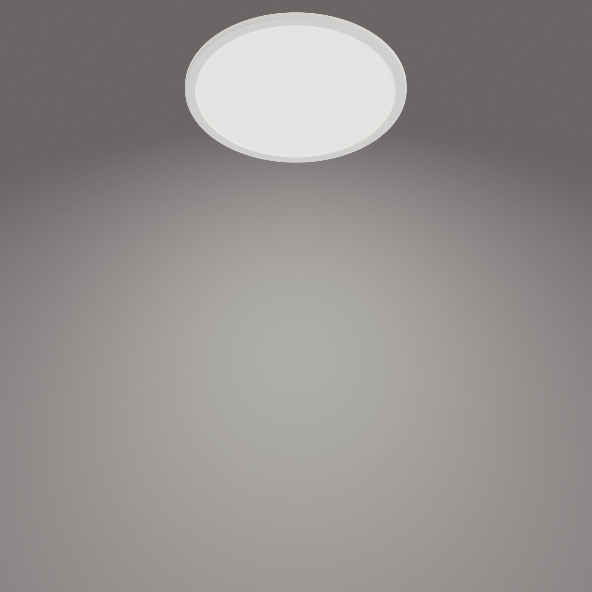 Un plafonnier LED rond blanc. Fond dégradé gris.