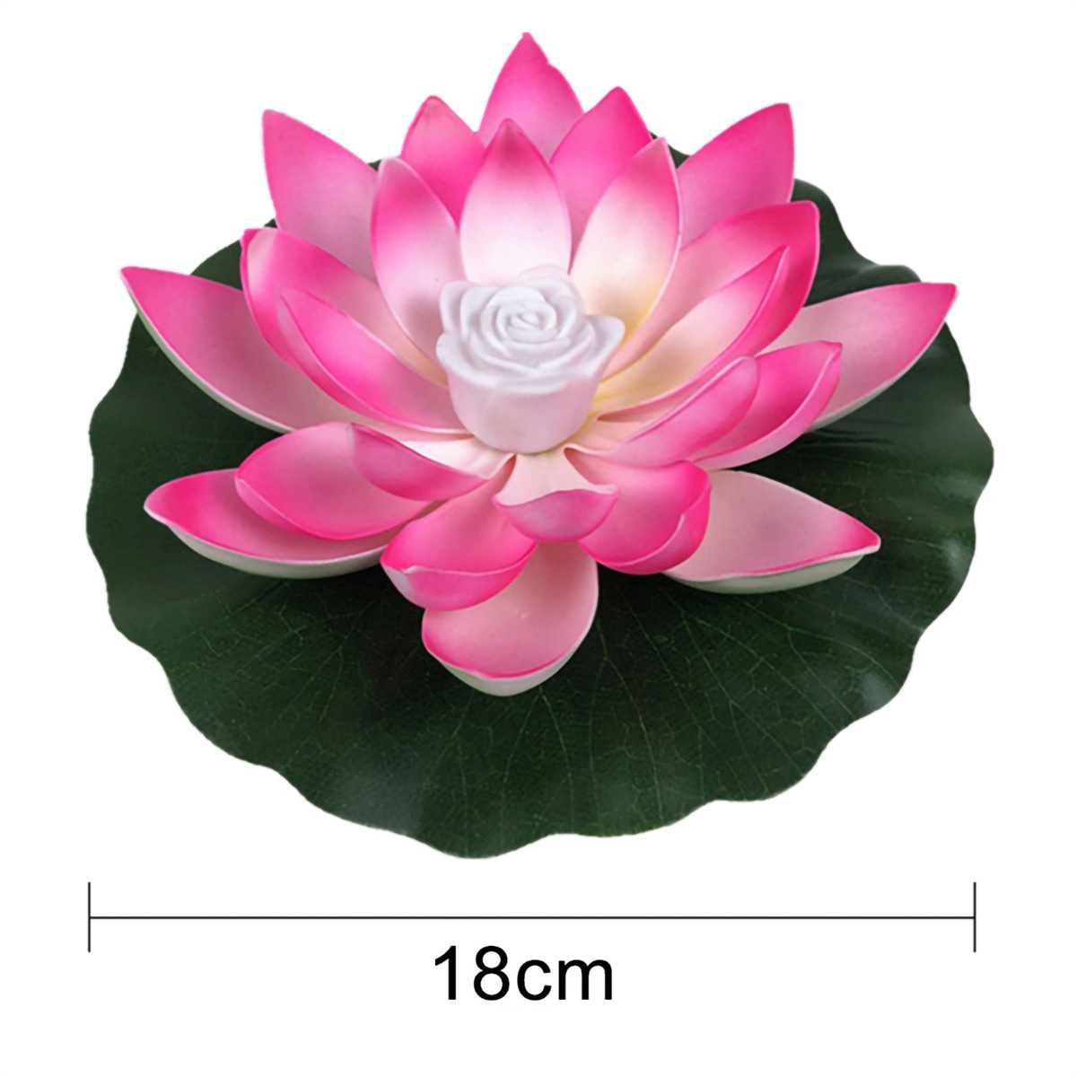 Rosa Lotusblume mit weißem Zentrum, die auf einem grünen Seerosenblatt schwimmt.