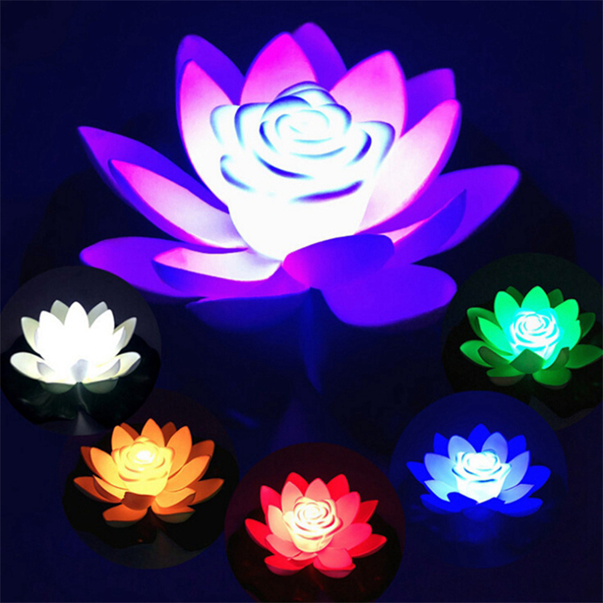 Schwimmende Lotusblumenlichter in verschiedenen Farben. Es ist ein dunkler Hintergrund.