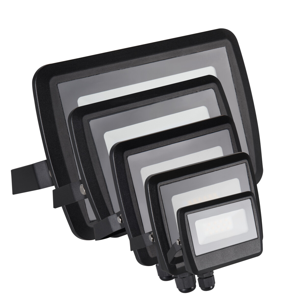 A set of black floodlights of different sizes, arranged diagonally on a white background.