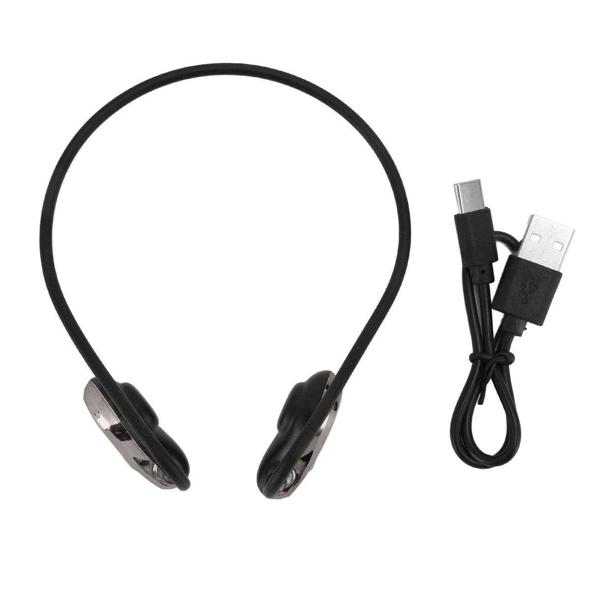 Schwarze Knochenschallkopfhörer mit Ladekabel, vor weißem Hintergrund.