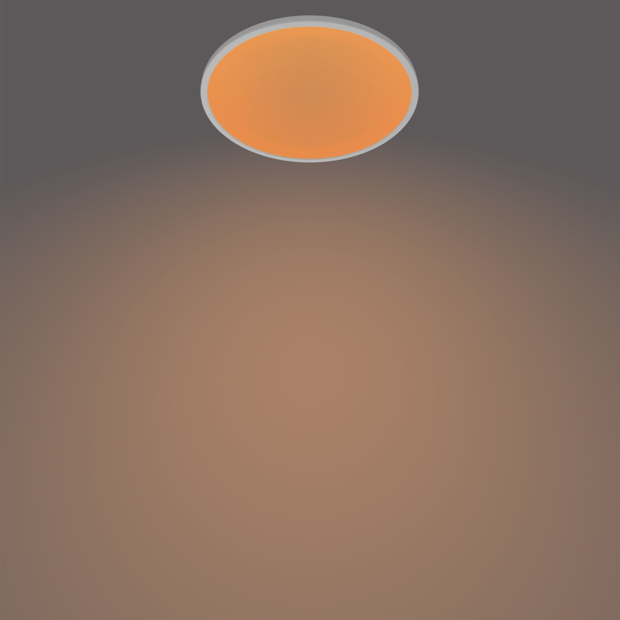 Plafoniera rotonda illuminata, bagliore arancione. Sfondo sfumato marrone.