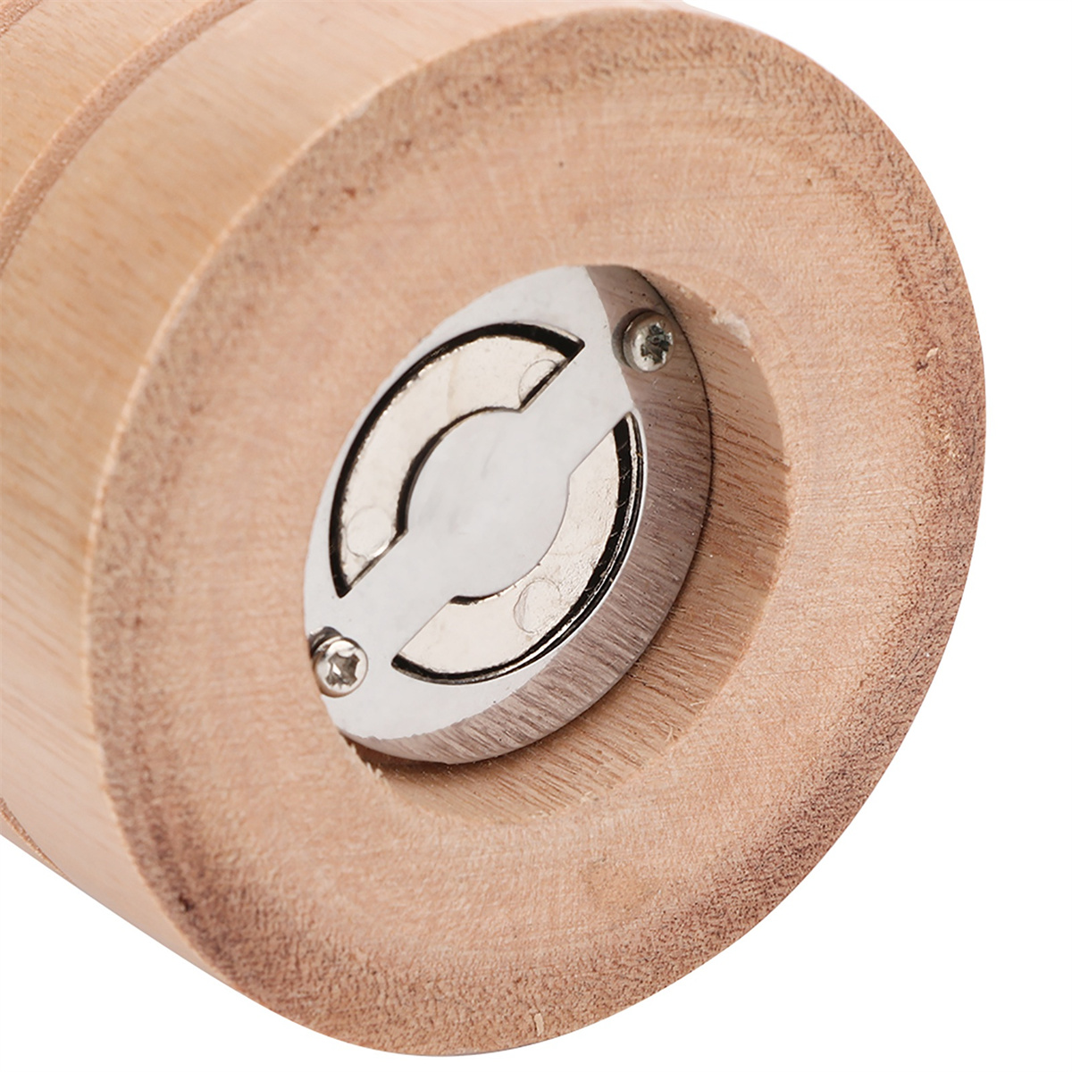 Nahaufnahme eines Holzmahler-Sockels. Ein Metallteil mit Schraube ist auf der Unterseite sichtbar.