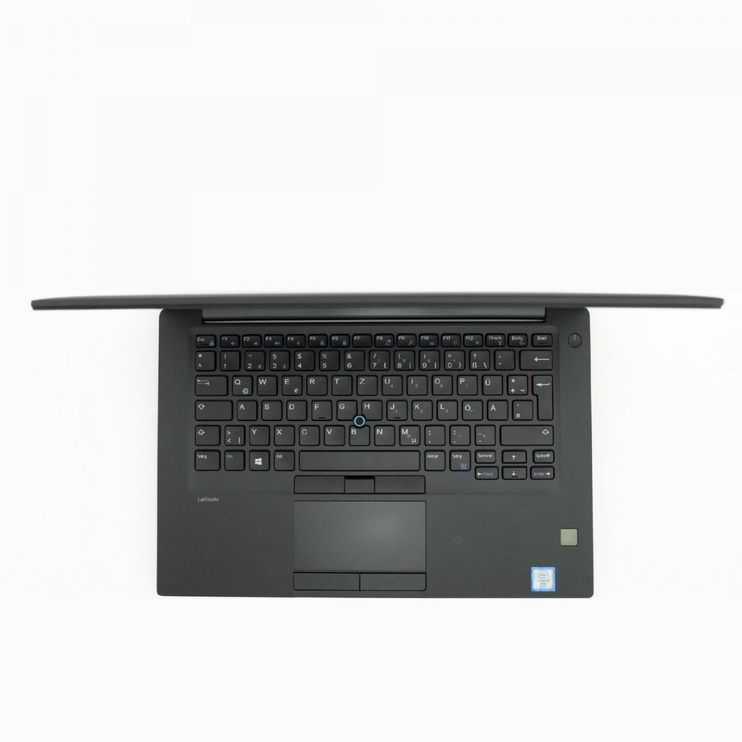 Ein schwarzer Laptop mit offenem Bildschirm auf weißer Oberfläche. Die Tastatur ist sichtbar.
