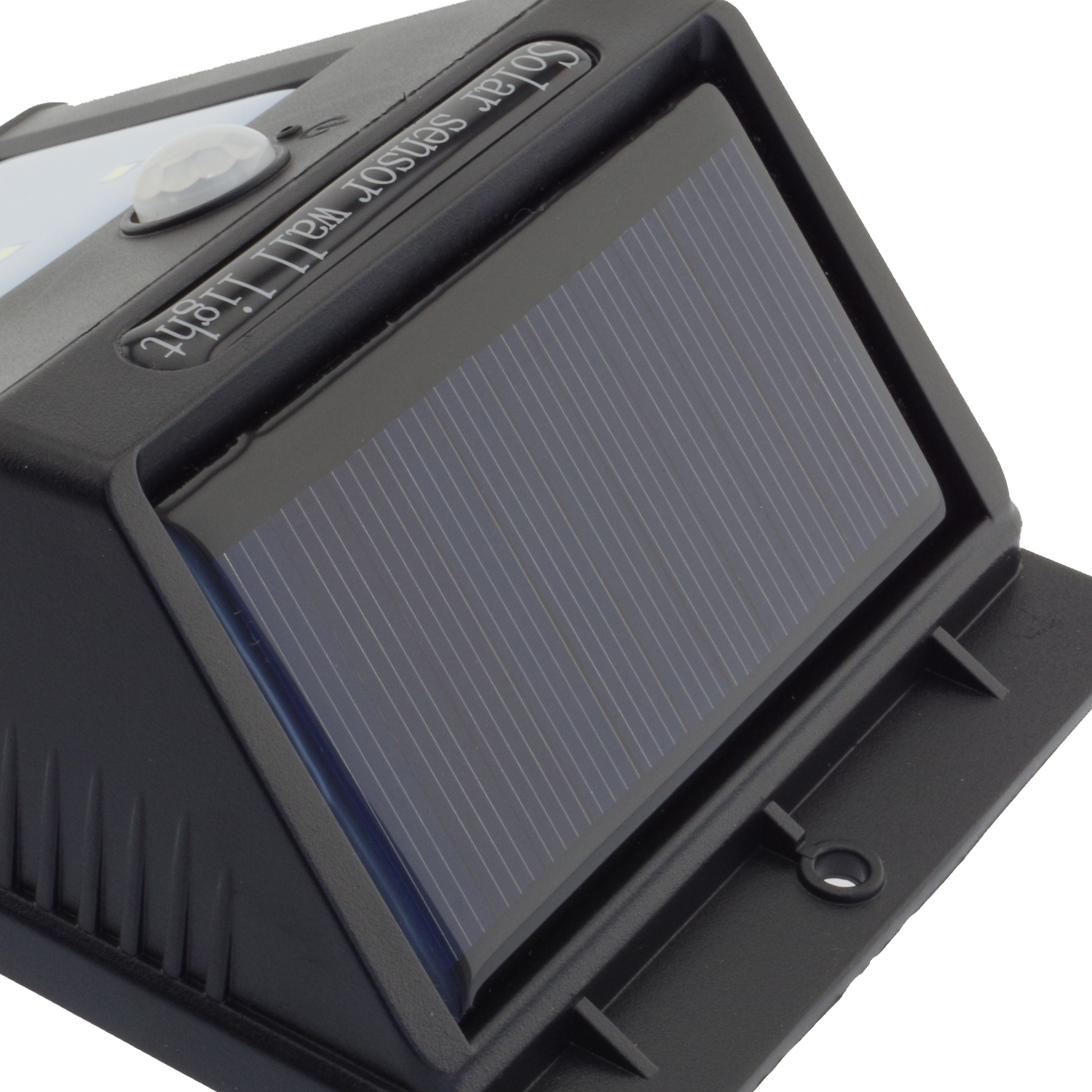 A black solar sensor wall light. Has solar panel and motion sensor on the top.
