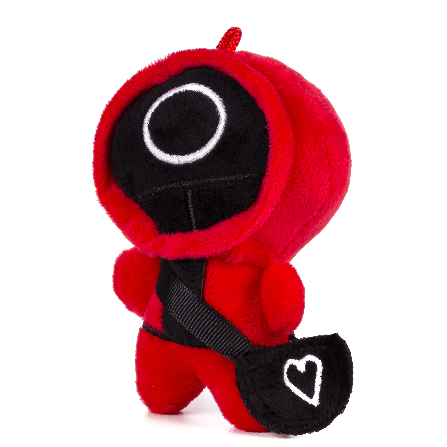 Un peluche rosso con una maschera nera e un occhio a cerchio bianco.