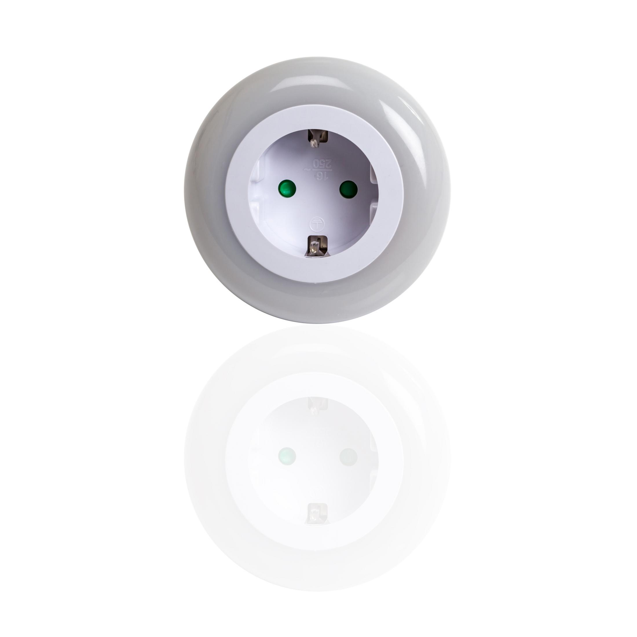 A gray, round electrical outlet with a white border, reflected below on a white surface.