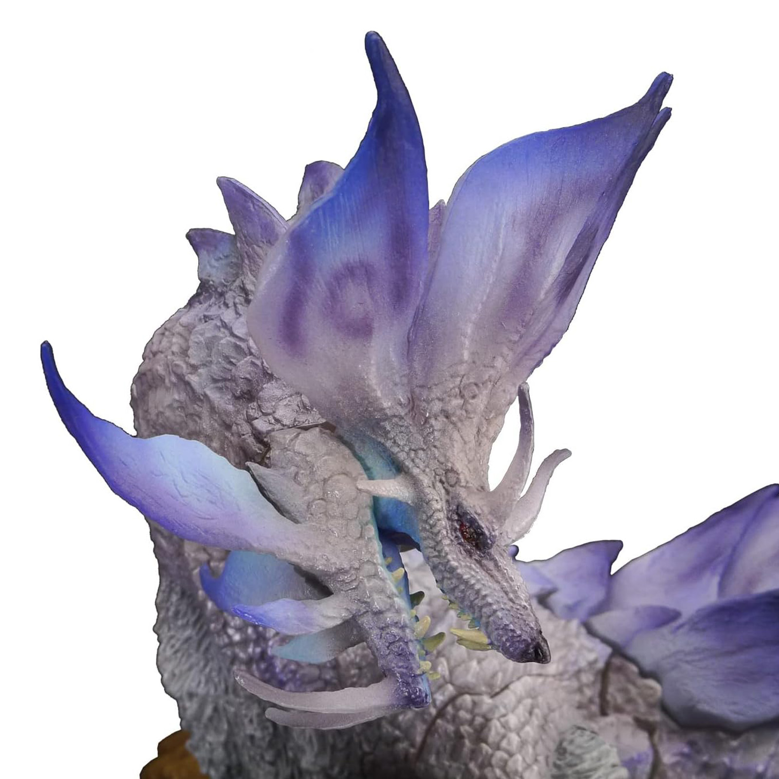 Eine Drachenfigur mit blauen und lila Akzenten. Der Drache hat große, flügelartige Merkmale.