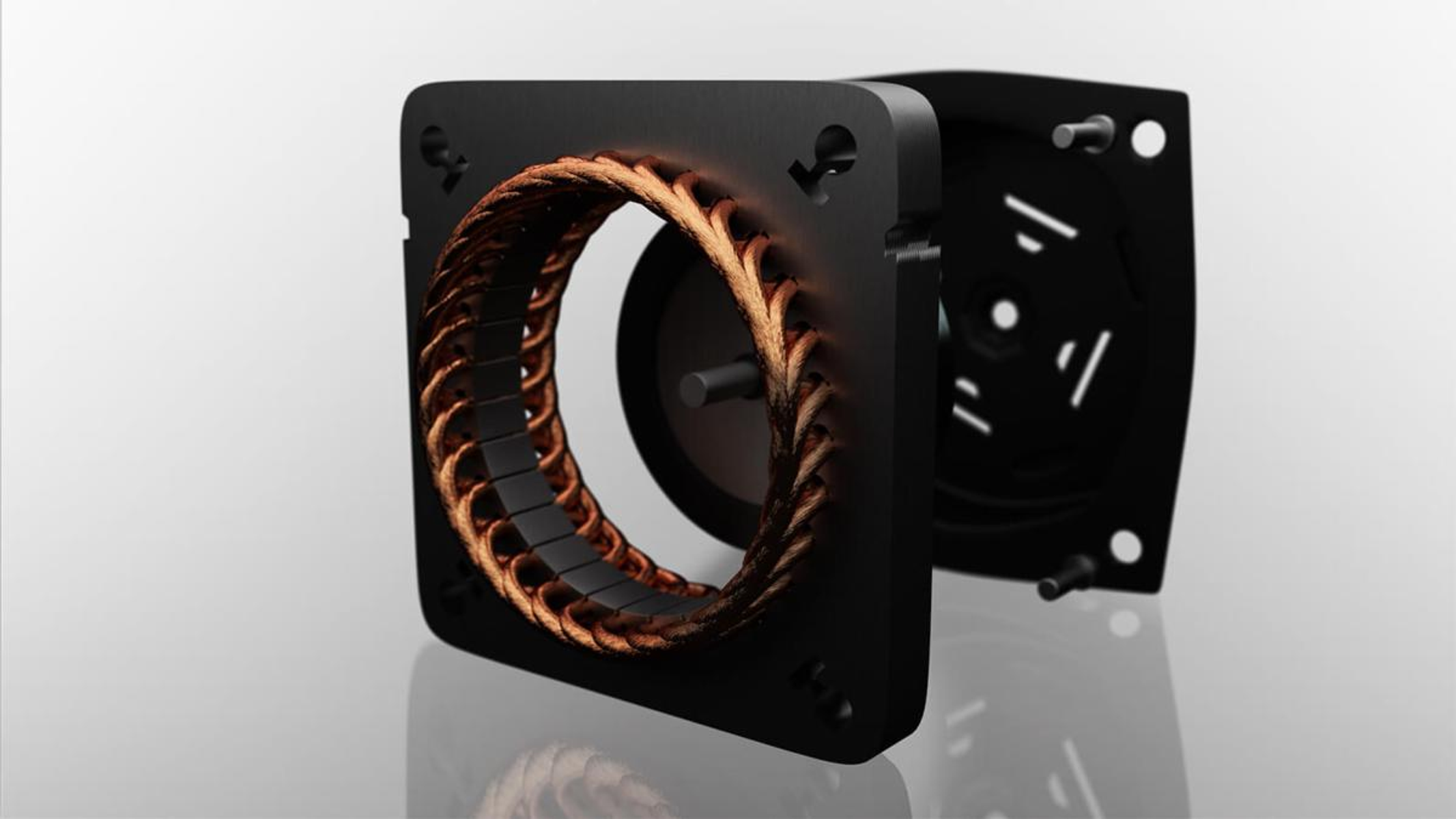 Una vista explotada de un componente de altavoz negro con cableado de cobre.