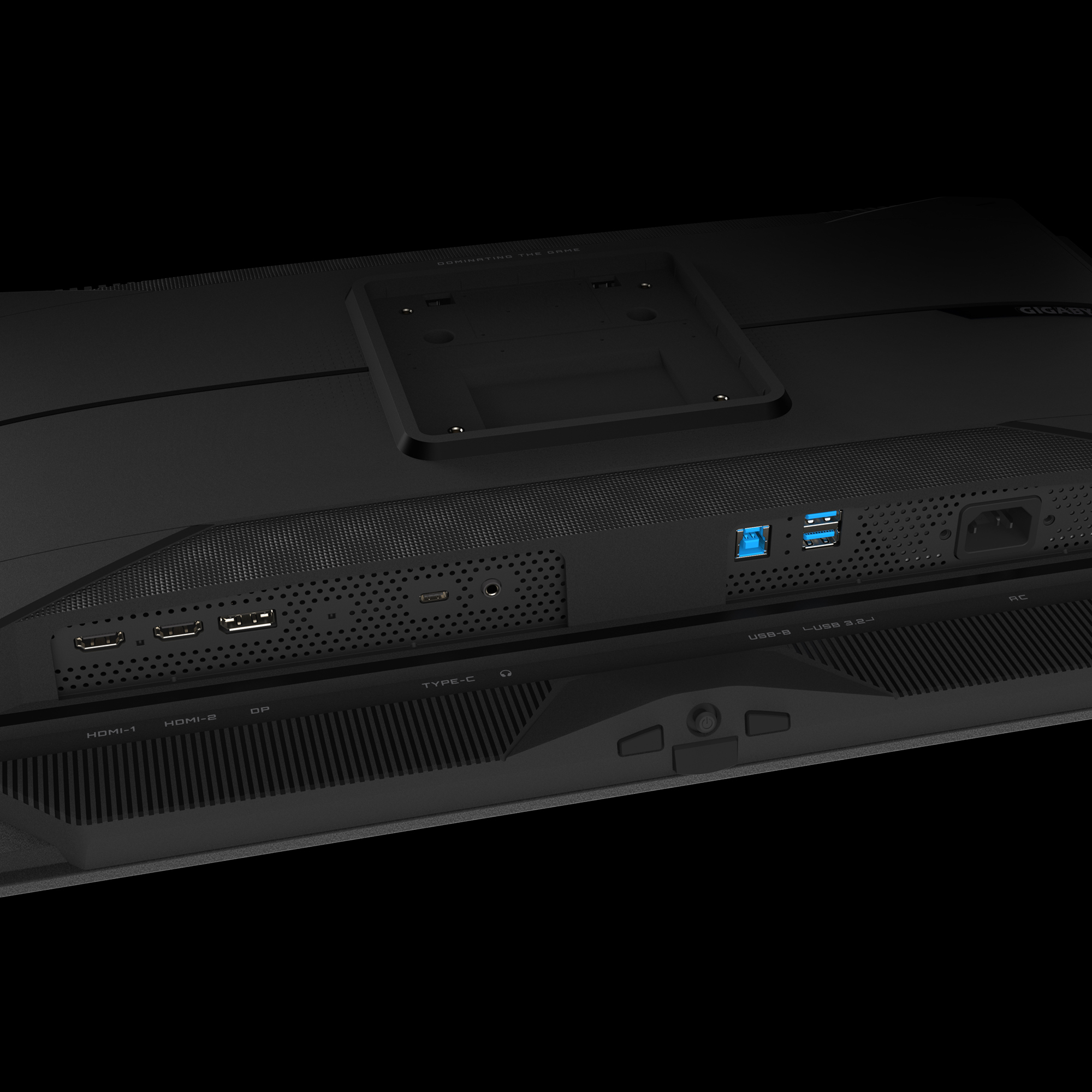 Tylny panel monitora z różnymi portami, w tym HDMI, USB i port zasilania.