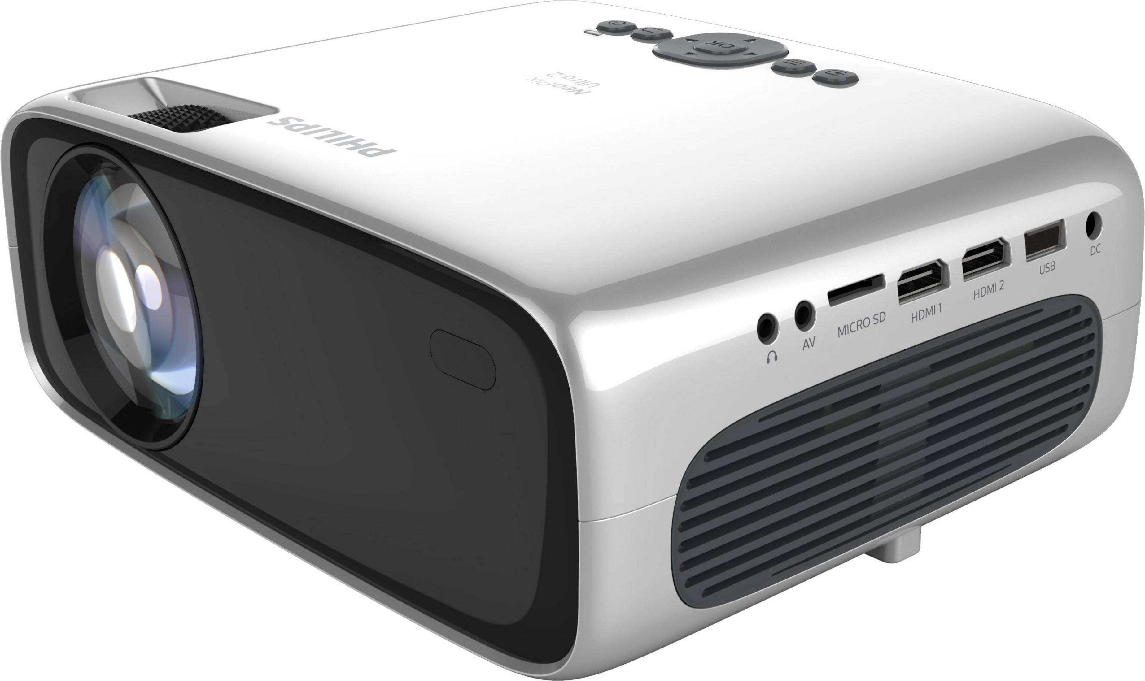 Un proyector blanco con múltiples puertos y botones, que muestra una lente y rejillas de ventilación.