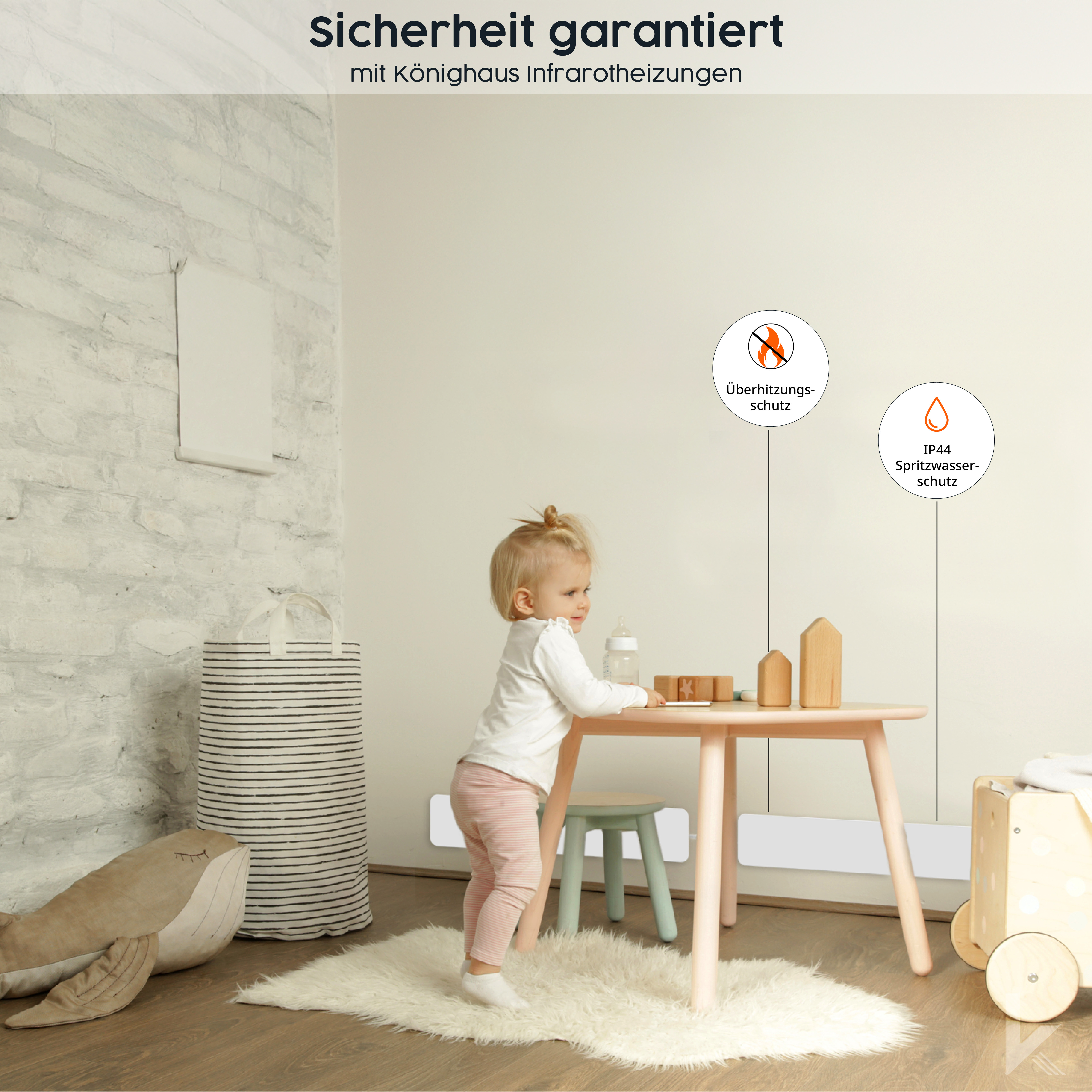 Ein kleines Mädchen in der Nähe eines Tisches mit einem weißen Heizgerät auf dem Boden.