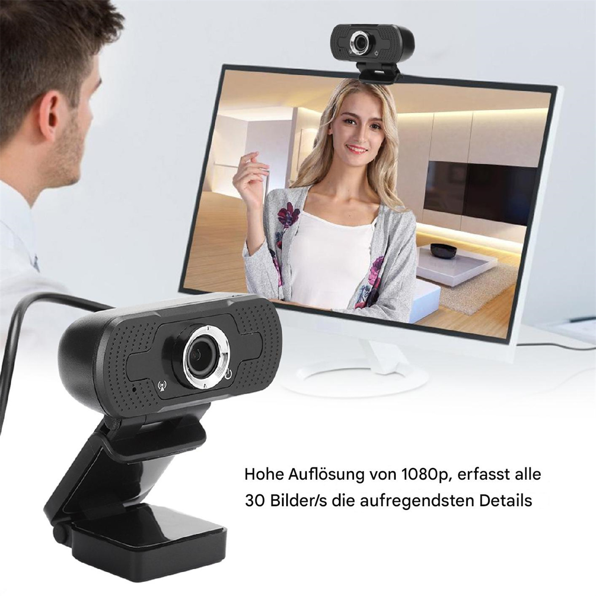 Webcam am Monitor, Frau auf dem Bildschirm, Mann im Hintergrund, Text über 1080p und Details.