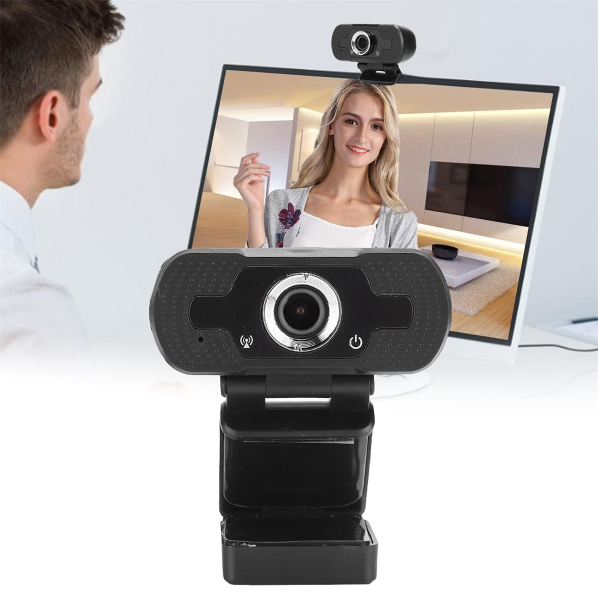 Webcam-Setup, das eine Frau auf dem Monitor zeigt. Zwei Webcams sind sichtbar.