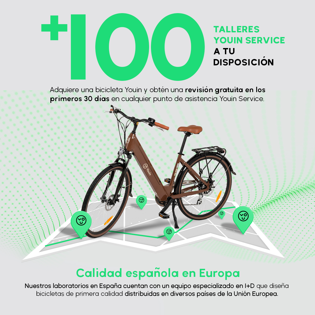 Brązowy rower elektryczny z mapą i zielonymi znacznikami lokalizacji oraz tekstem w języku hiszpańskim.