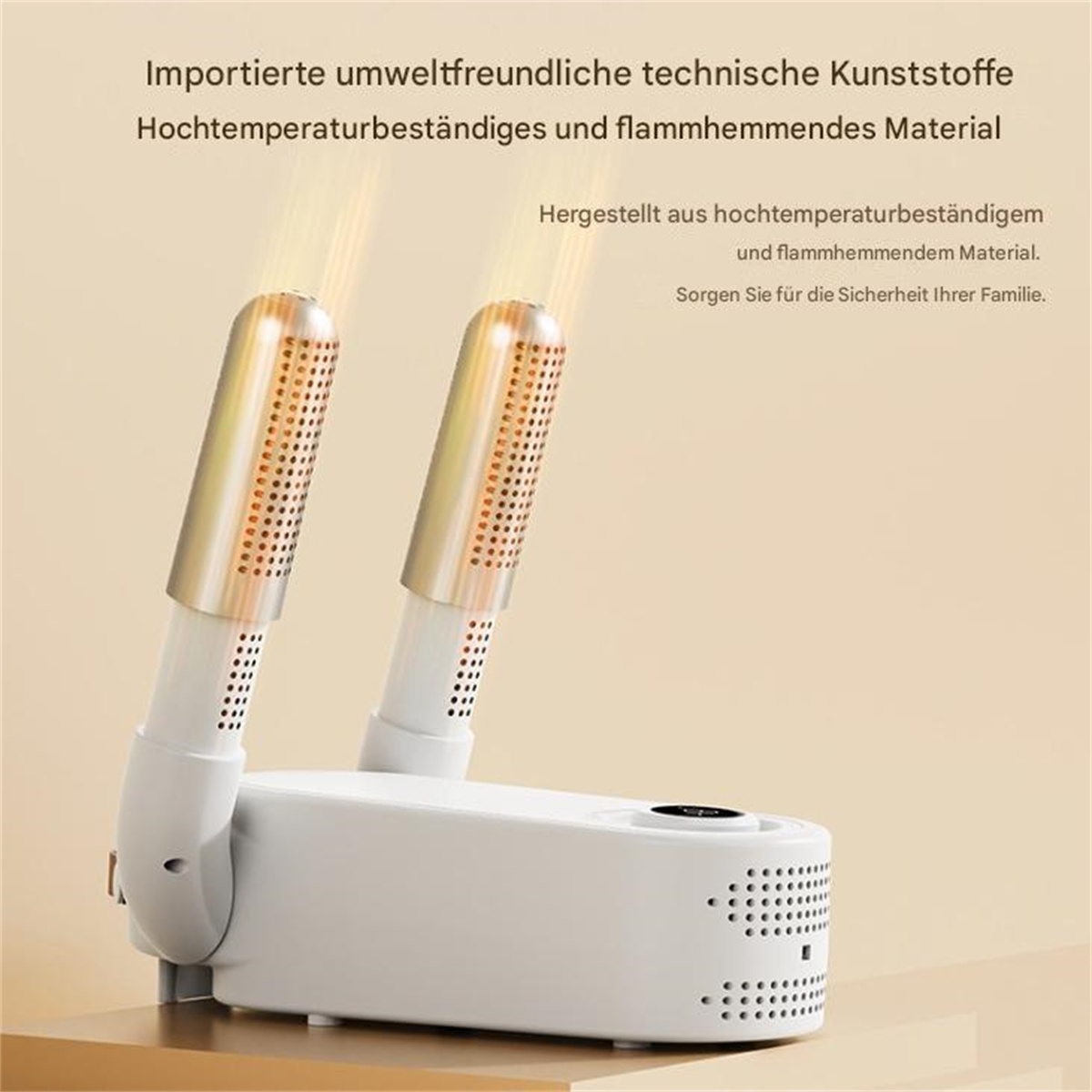 Weiß-goldenes Gerät mit Text, zwei nach oben zeigenden Düsen und etwas Licht.