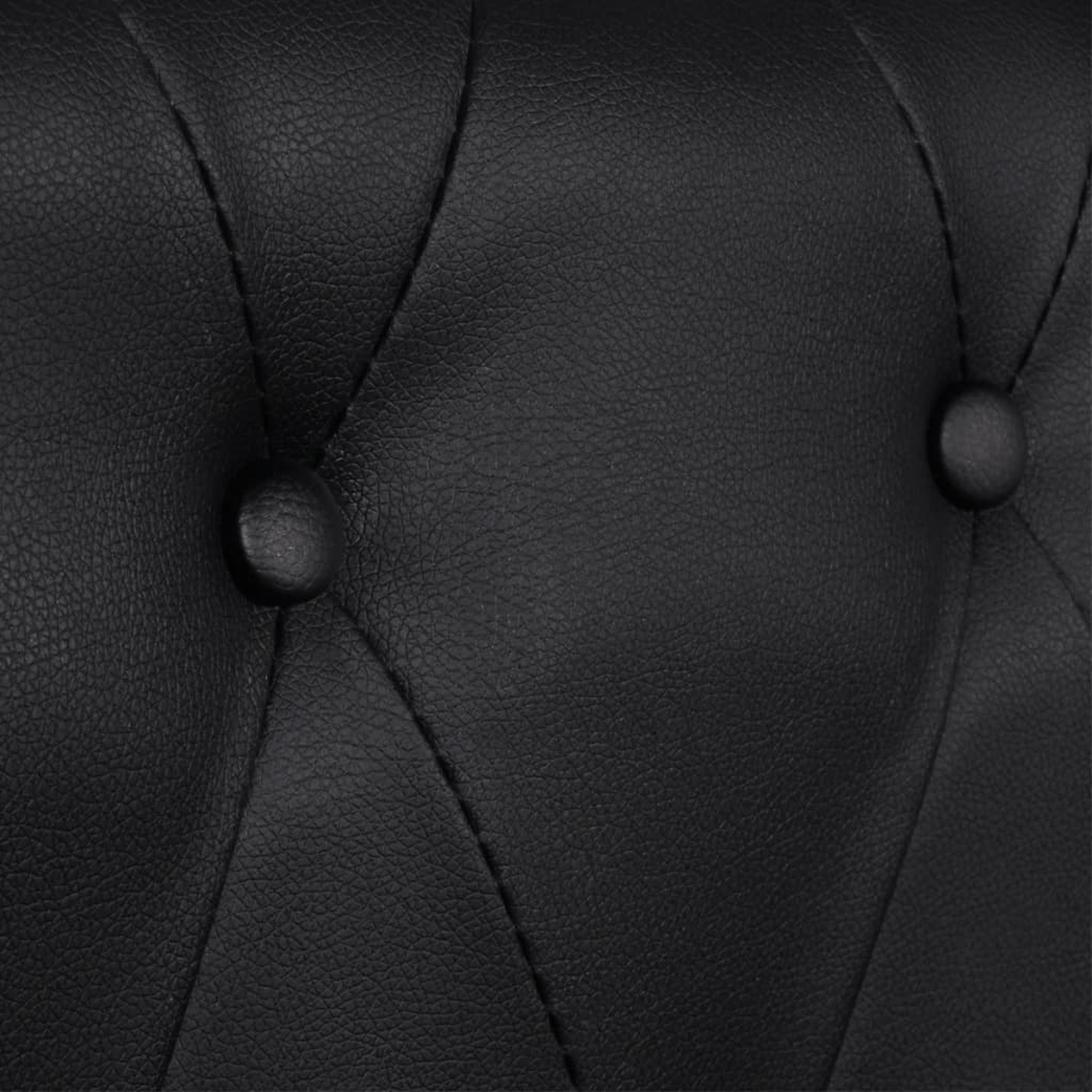 Schwarze Lederoberfläche. Nahaufnahme des getufteten Designs mit Knöpfen. Dunkle, strukturierte Oberfläche.