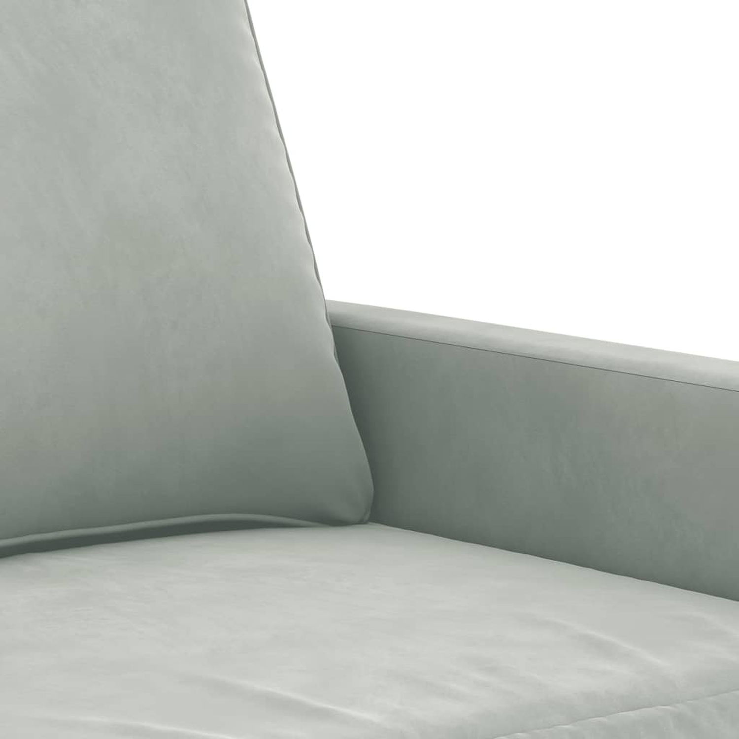 Nahaufnahme eines hellgrauen Sofas, das ein Kissen und eine Armlehne vor weißem Hintergrund zeigt.