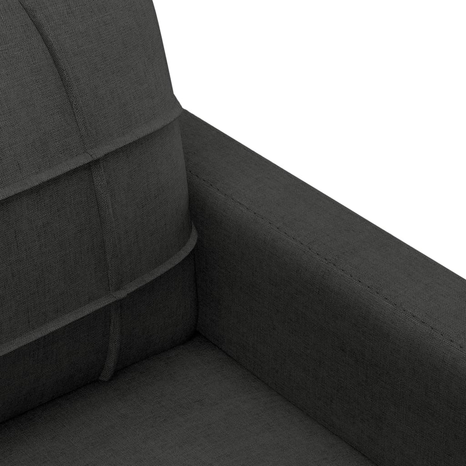 Nahaufnahme der Armlehne eines dunkelgrauen Sofas, zeigt Nähte und Stoffstruktur.