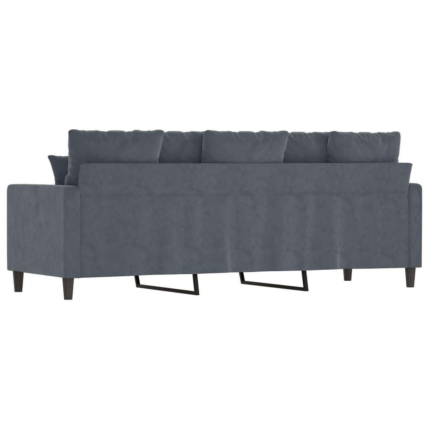 Ein blaues Samtsofa mit Kissen, von hinten gesehen, mit schwarzen Beinen.