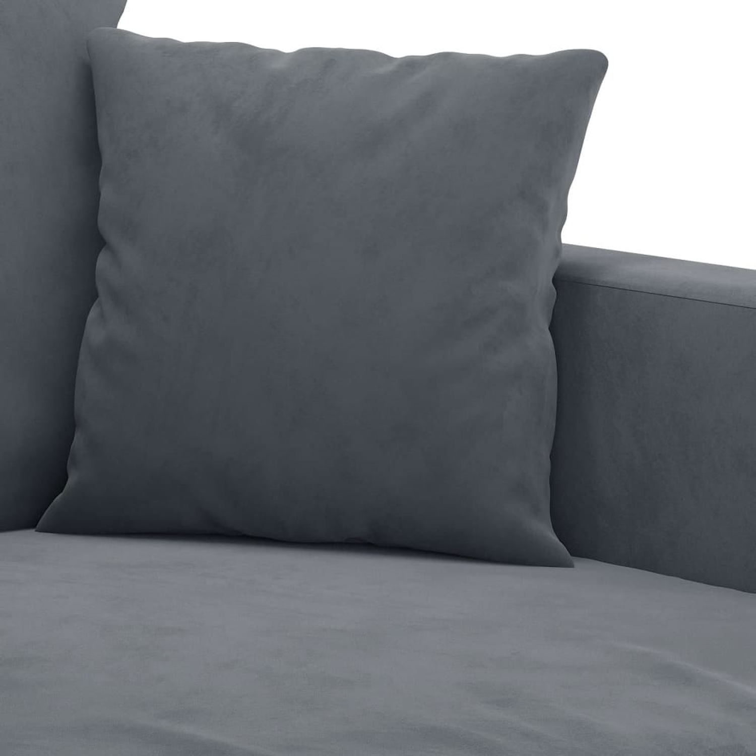 Nahaufnahme eines grauen Kissens auf einem grauen Sofa.