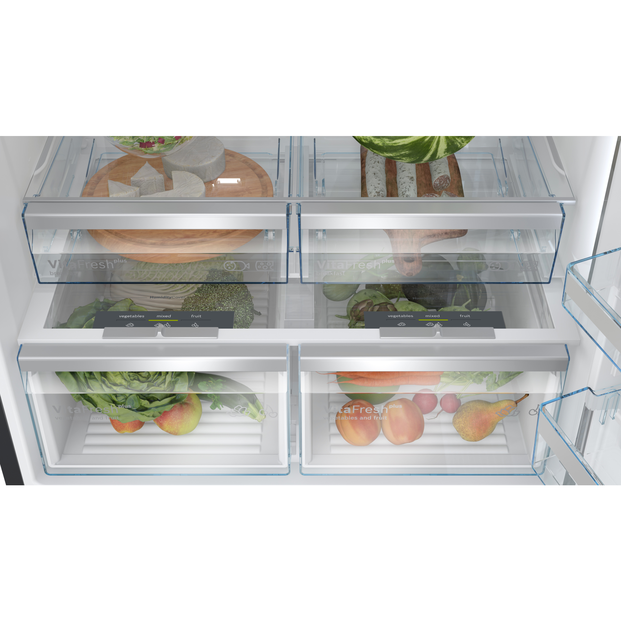 Un interior de refrigerador con compartimentos organizados que contienen verduras y frutas.