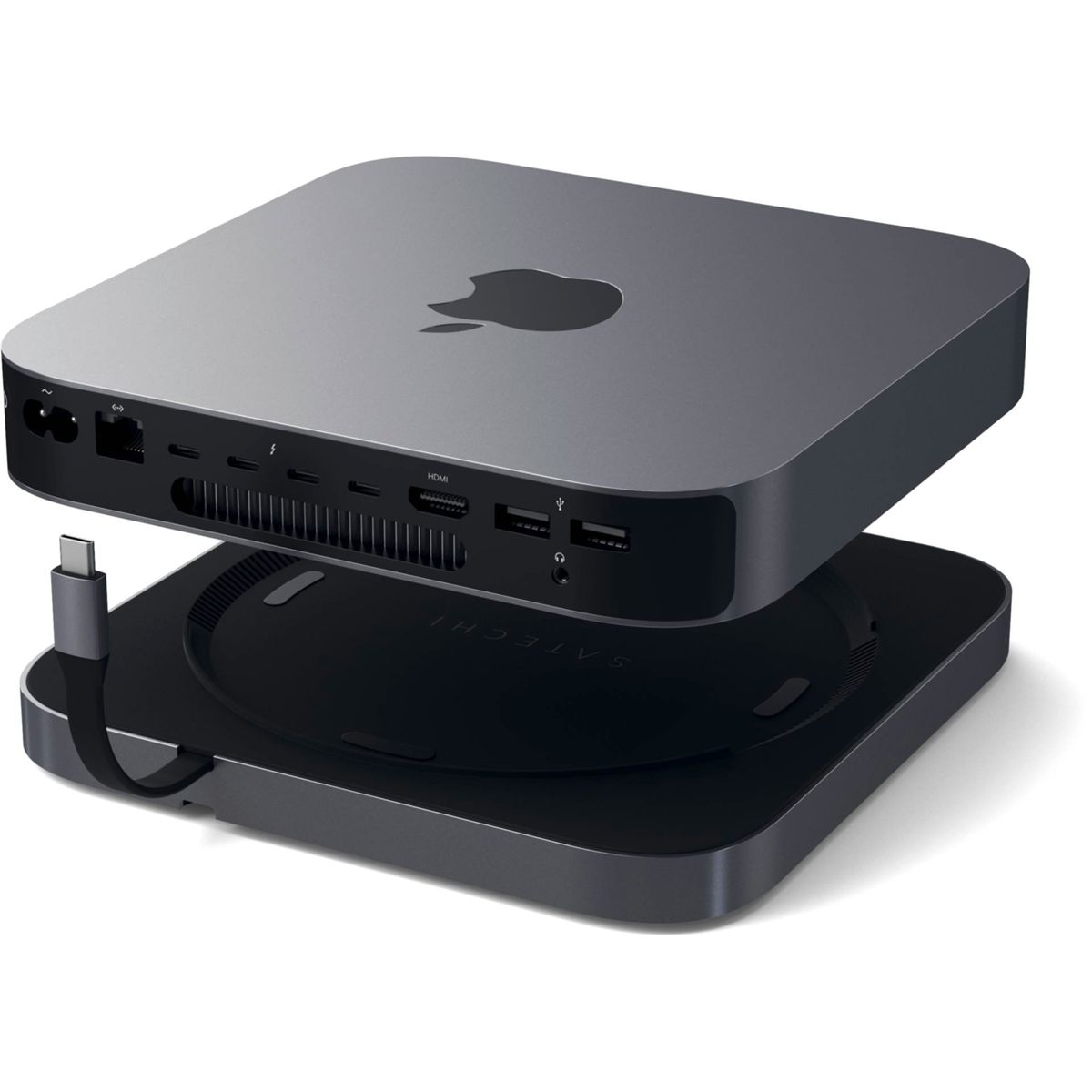 Ein Mac Mini-Computer auf einem Ständer, mit einem Kabel.